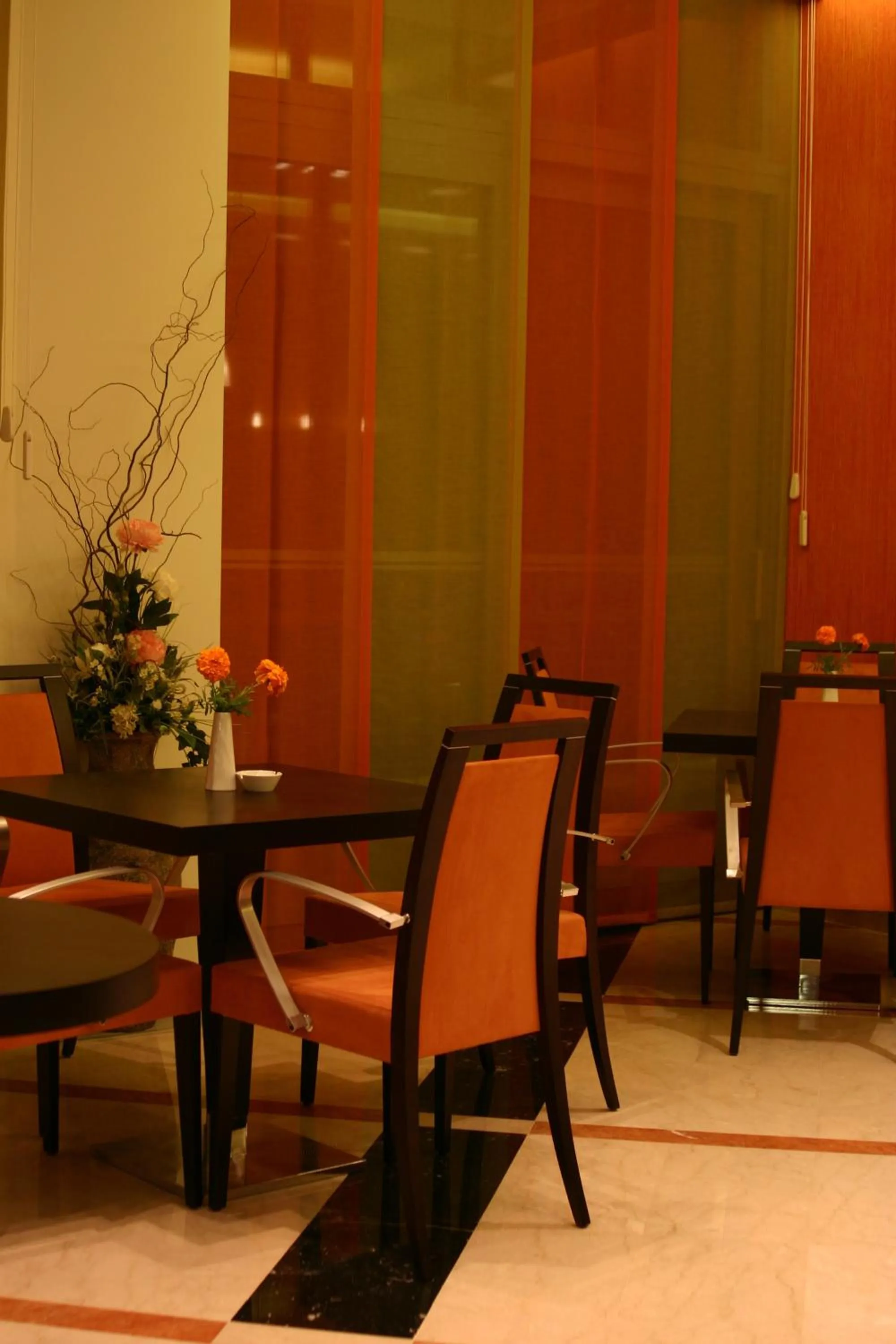 Communal lounge/ TV room in Alexandros Boutique Hotel