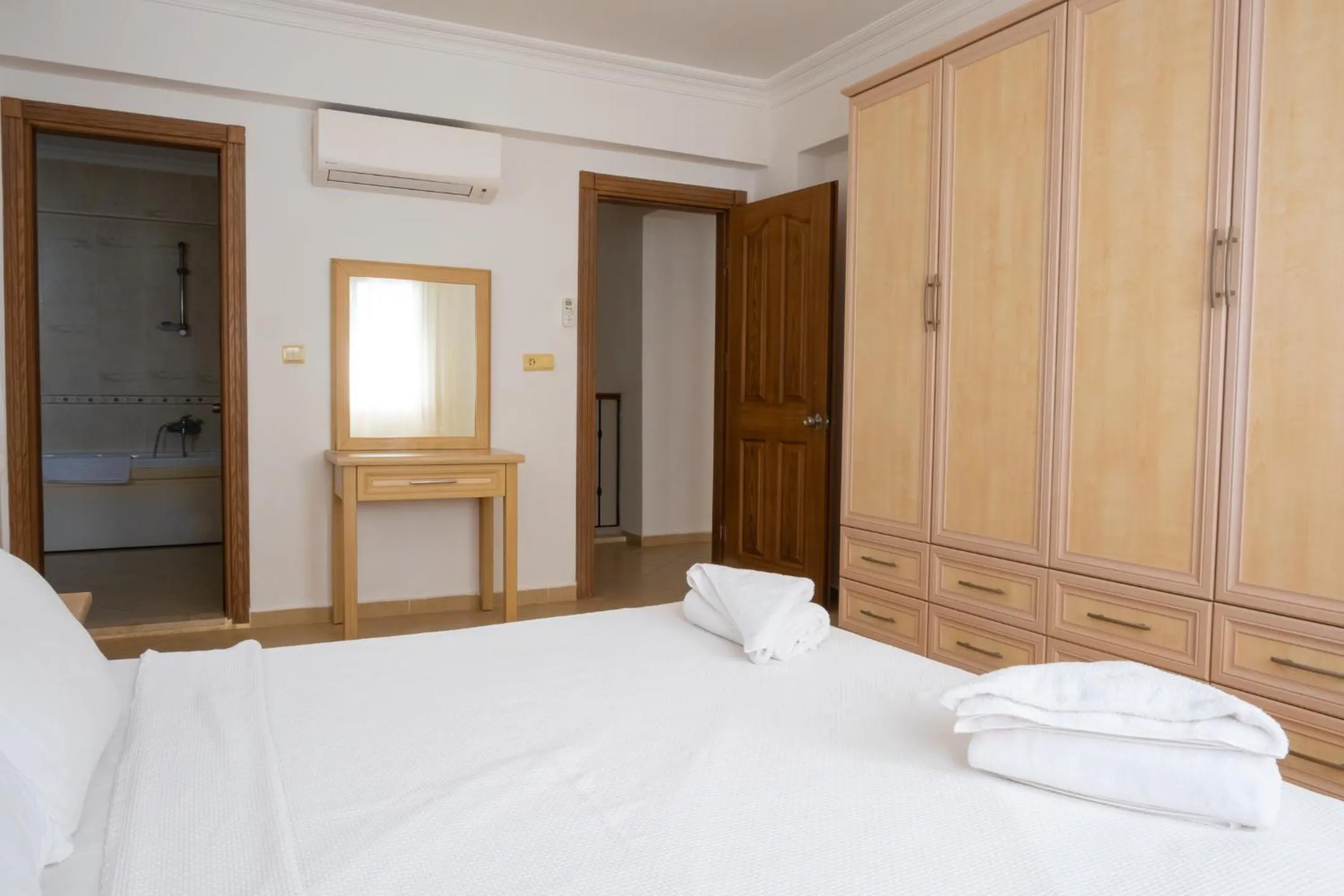 Bedroom, Bed in Perdikia Hill Hotel And Villas