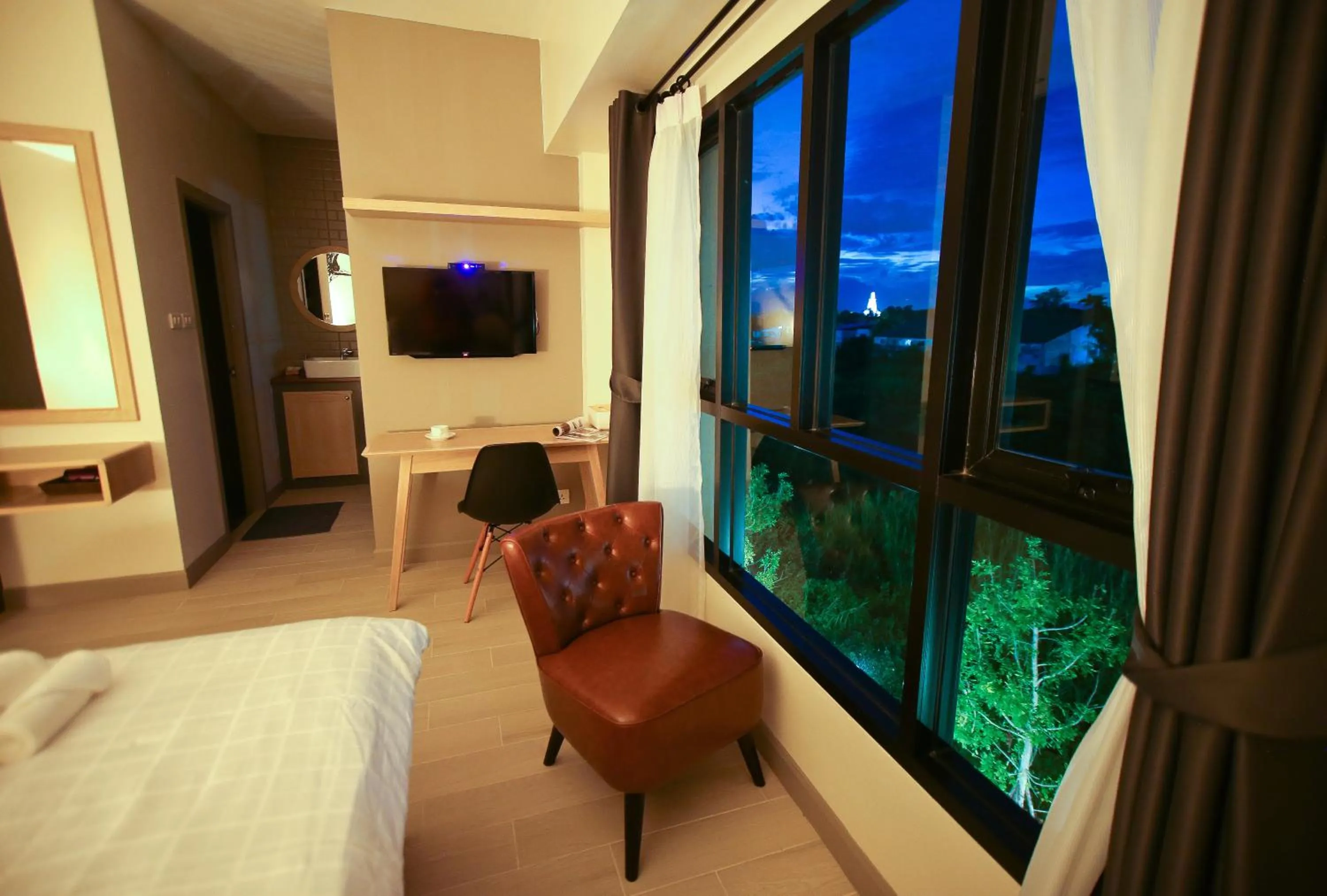 Bed in Bunprasop Garden Hotel