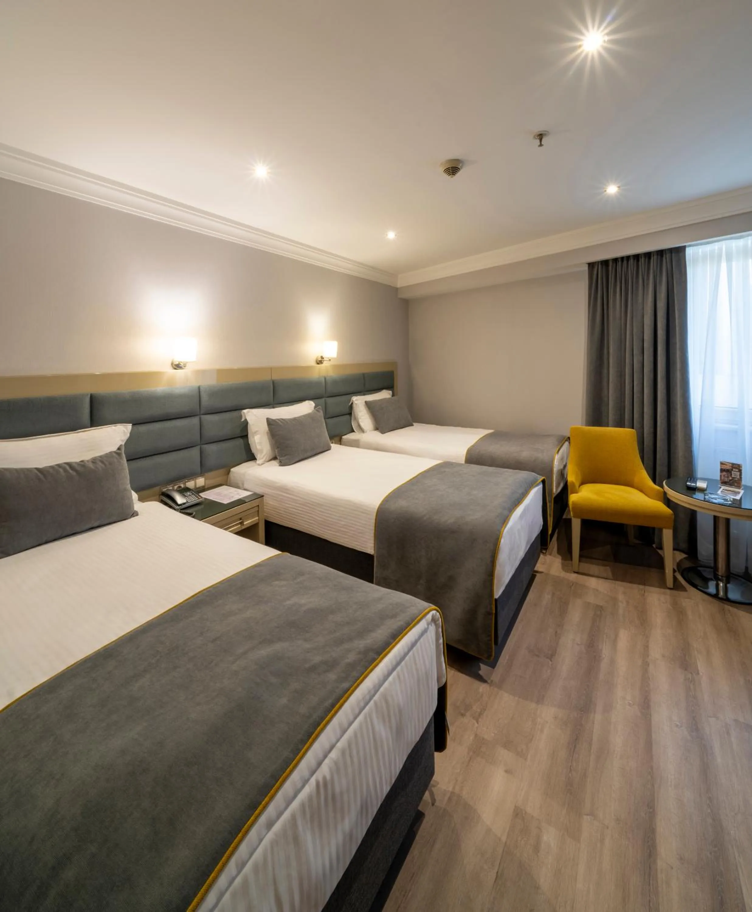 Bed in Amethyst Hotel