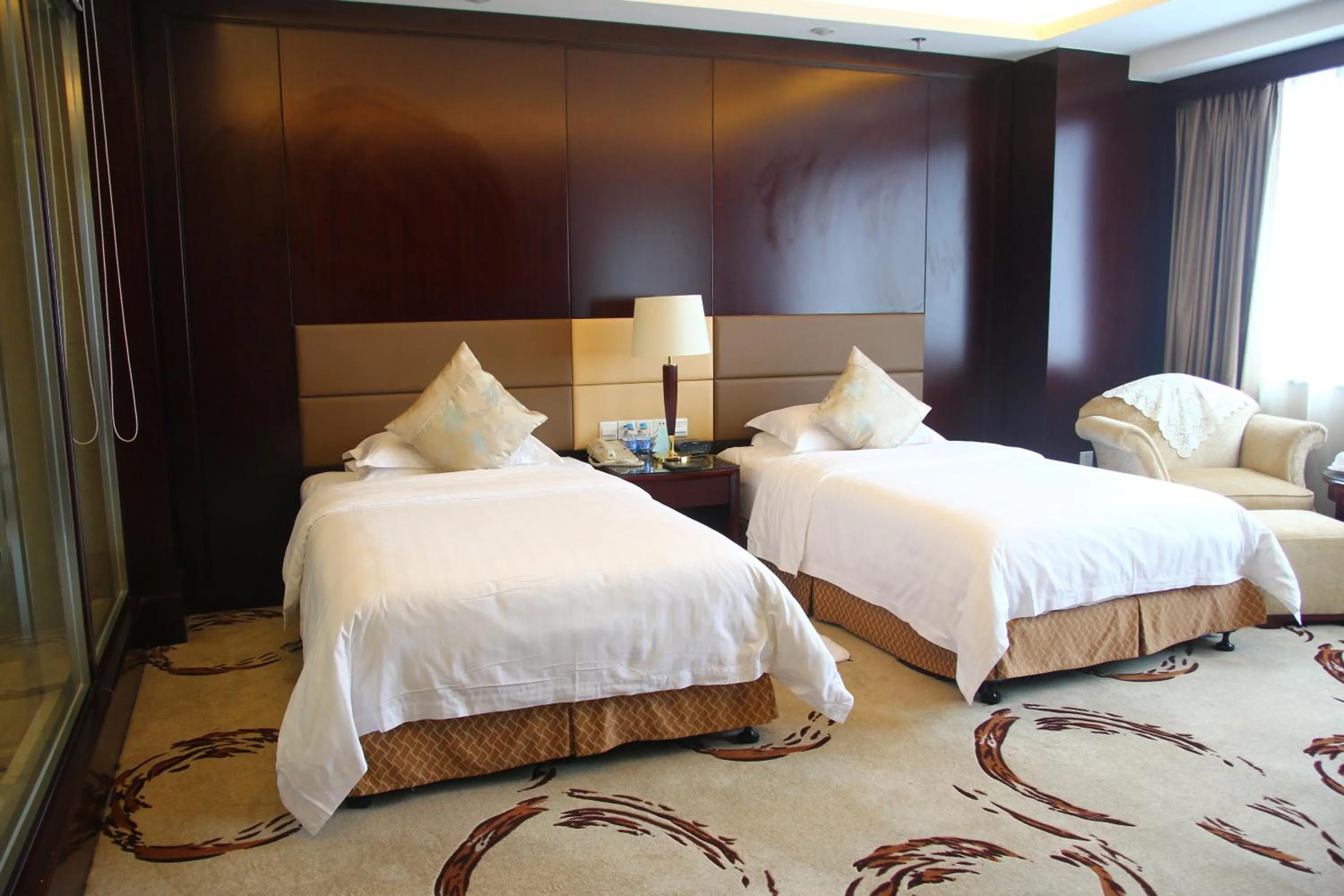 Bed in Huafang Jinling International Hotel Zhangjiagang
