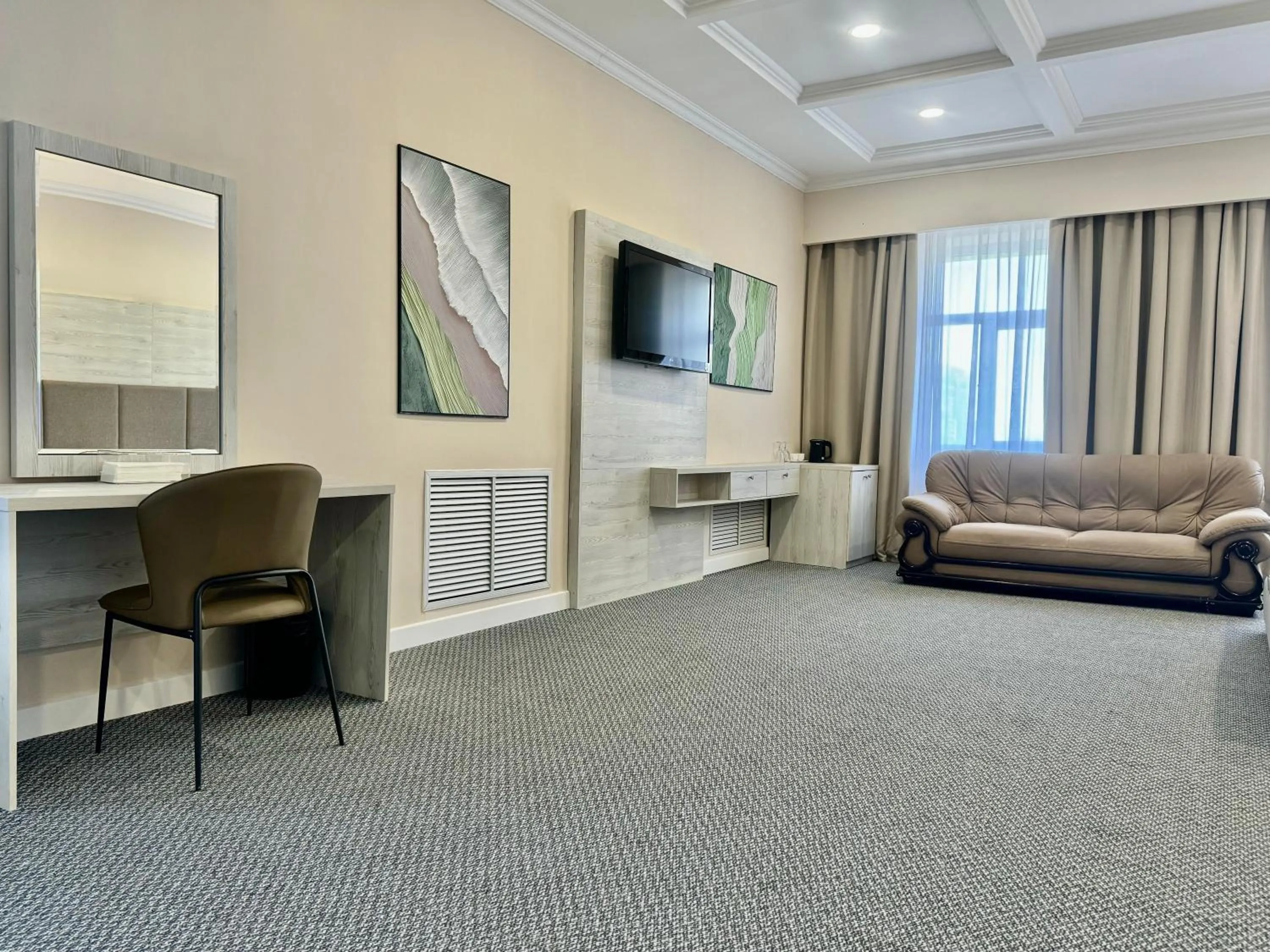 Communal lounge/ TV room in Grand Hotel Eurasia