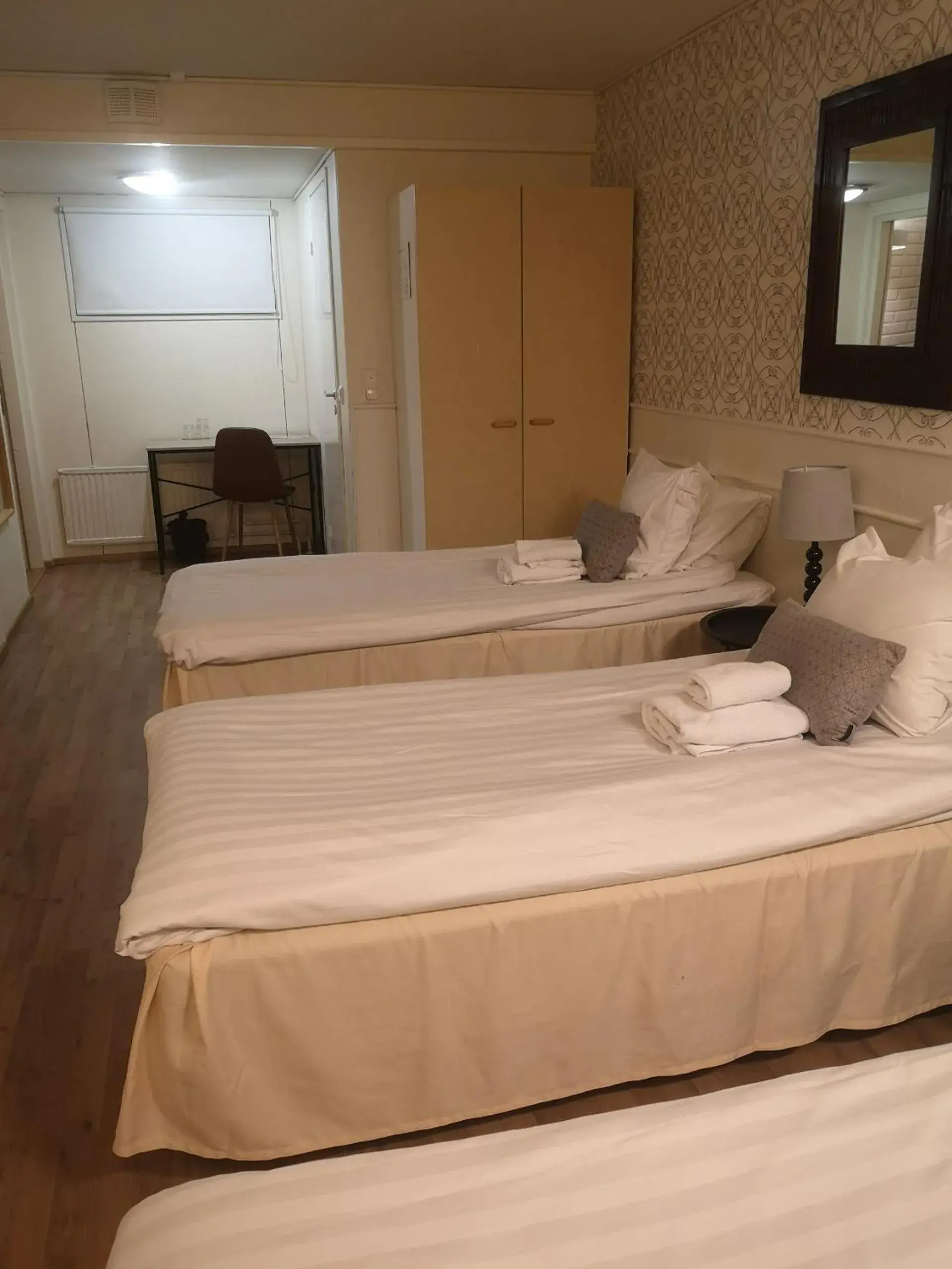 Triple Room in Hotel Kajaani Triple Room in Hotel Kajaani