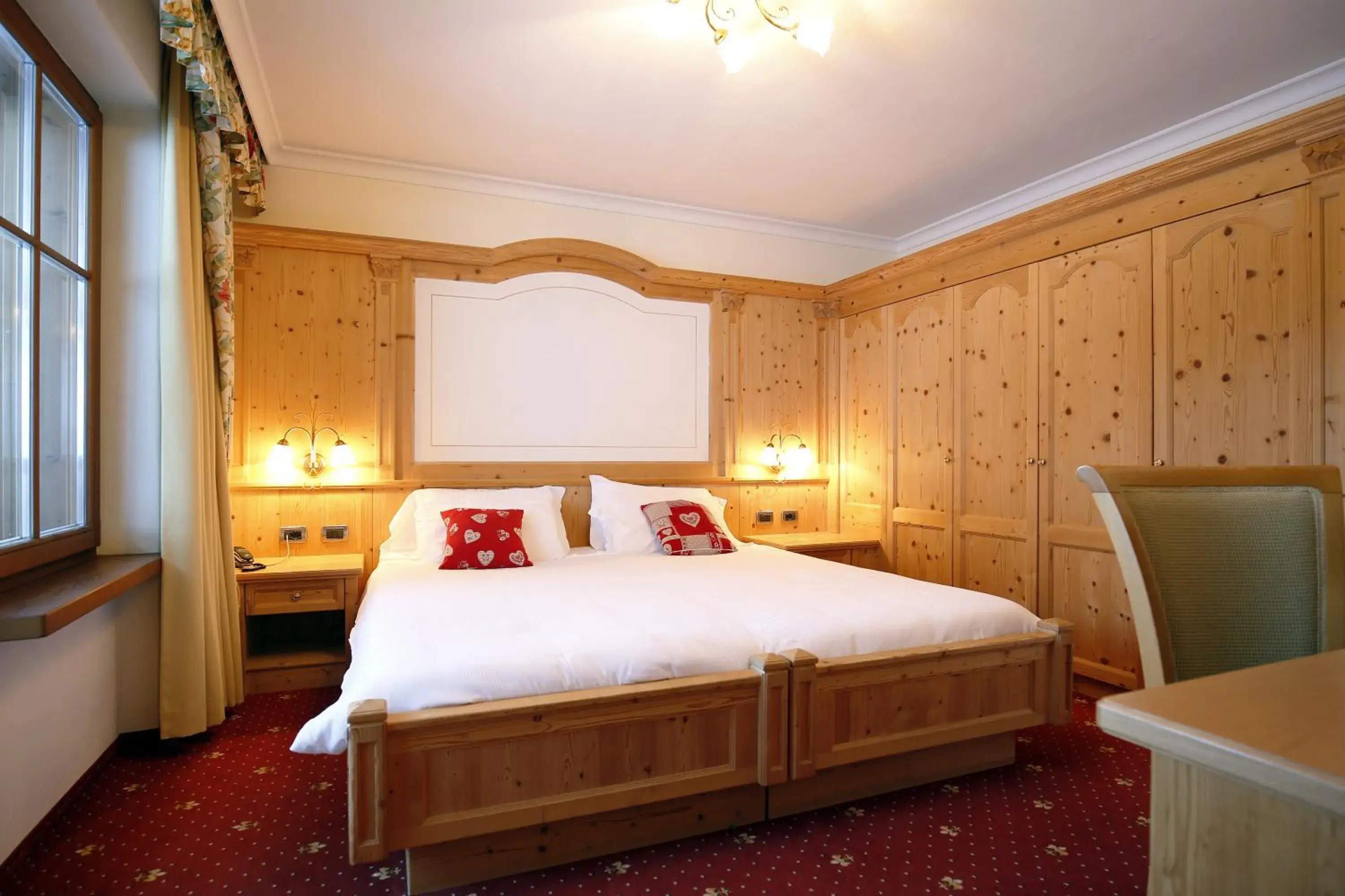 Bed in TH Corvara - Greif Hotel Bed in TH Corvara - Greif Hotel