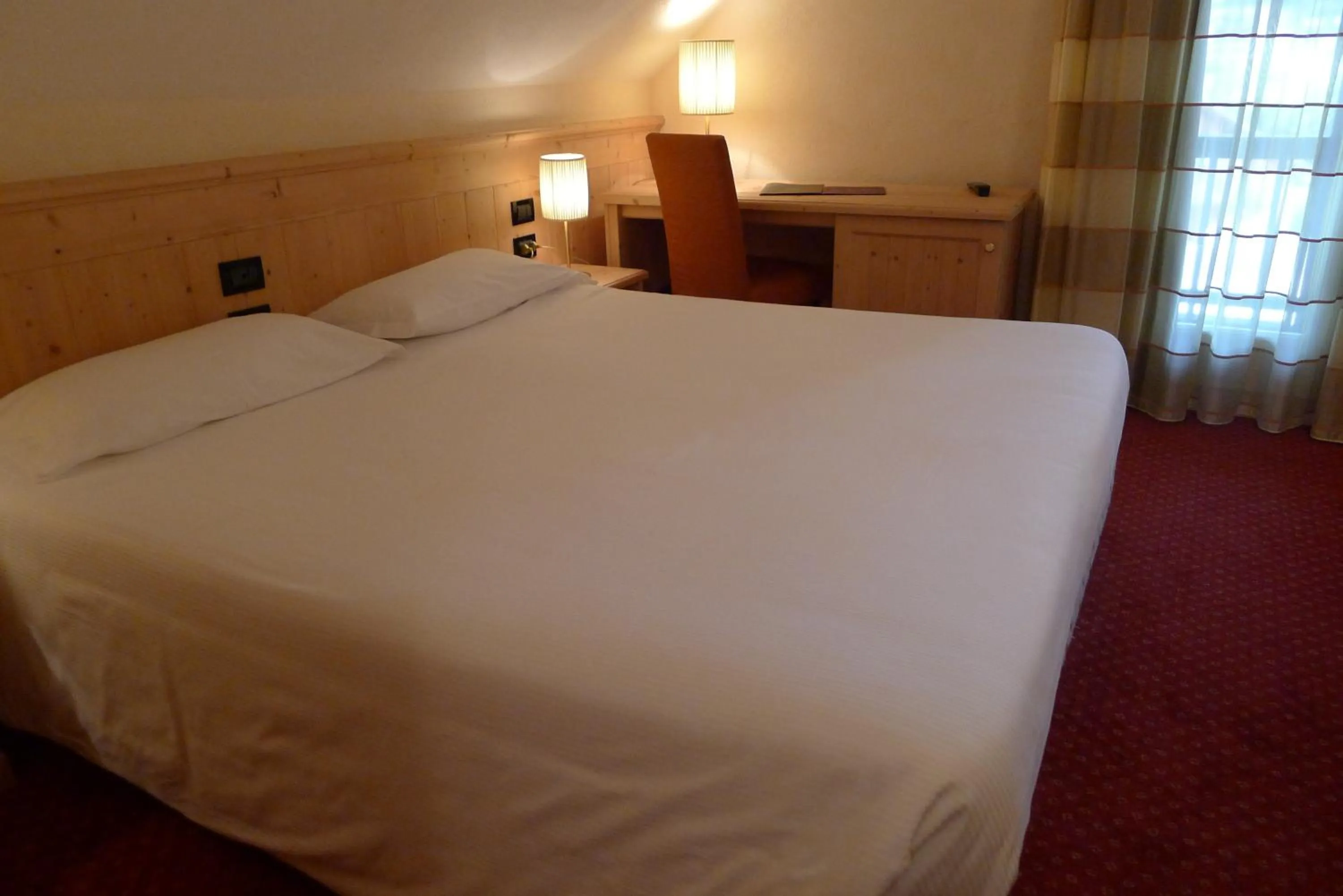 Bed in TH Corvara - Greif Hotel