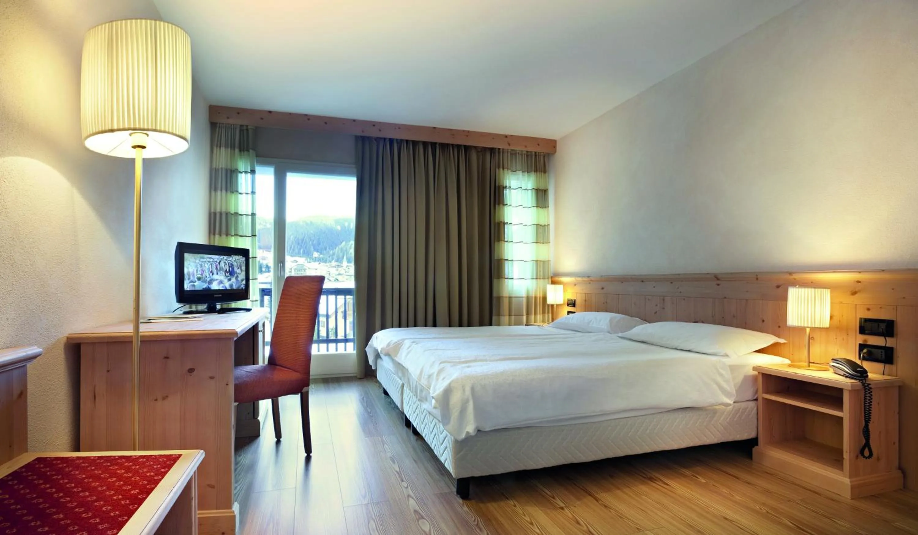 Photo of the whole room, Bed in TH Corvara - Greif Hotel