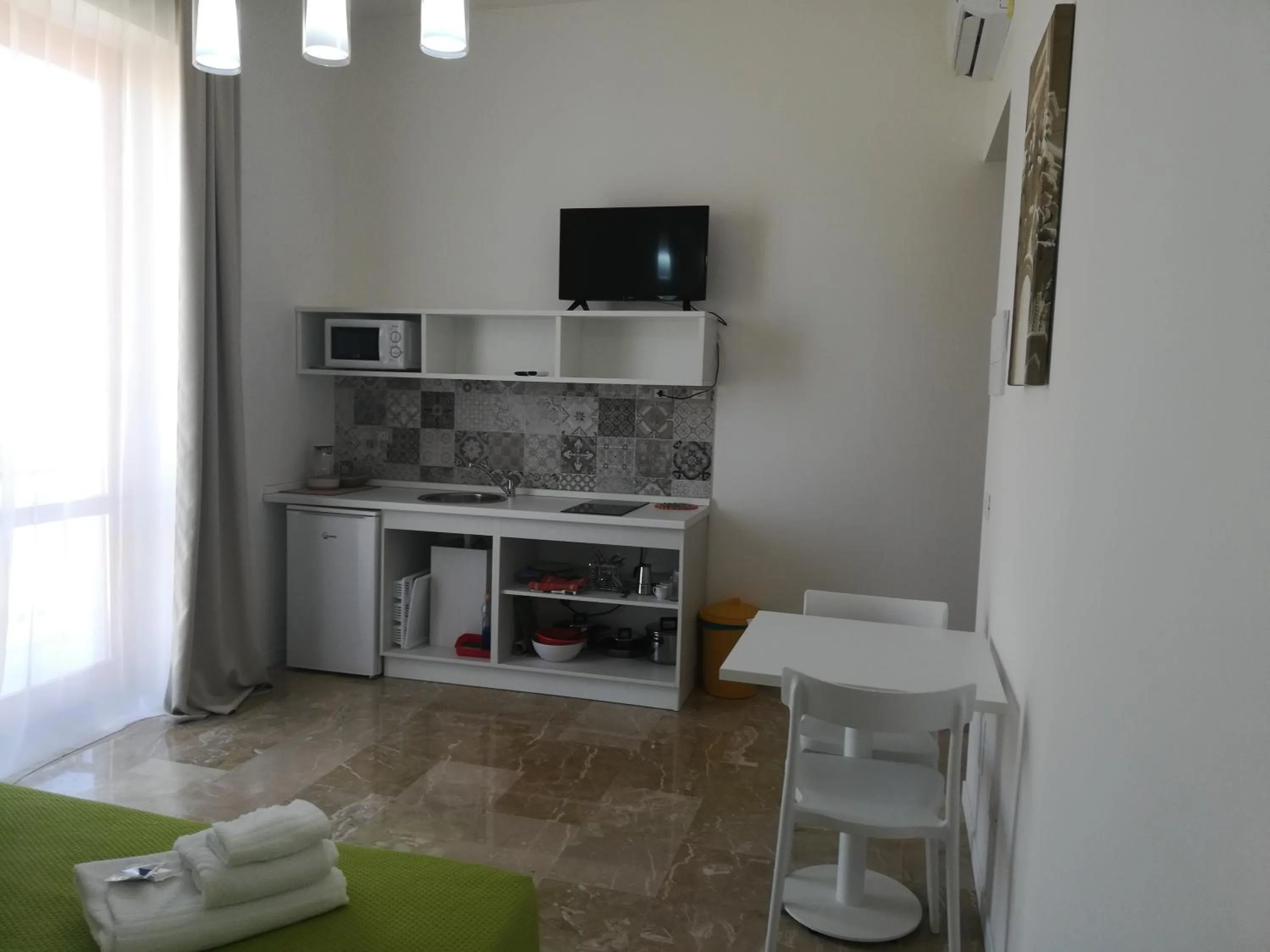 Kitchen or kitchenette in Archinuè