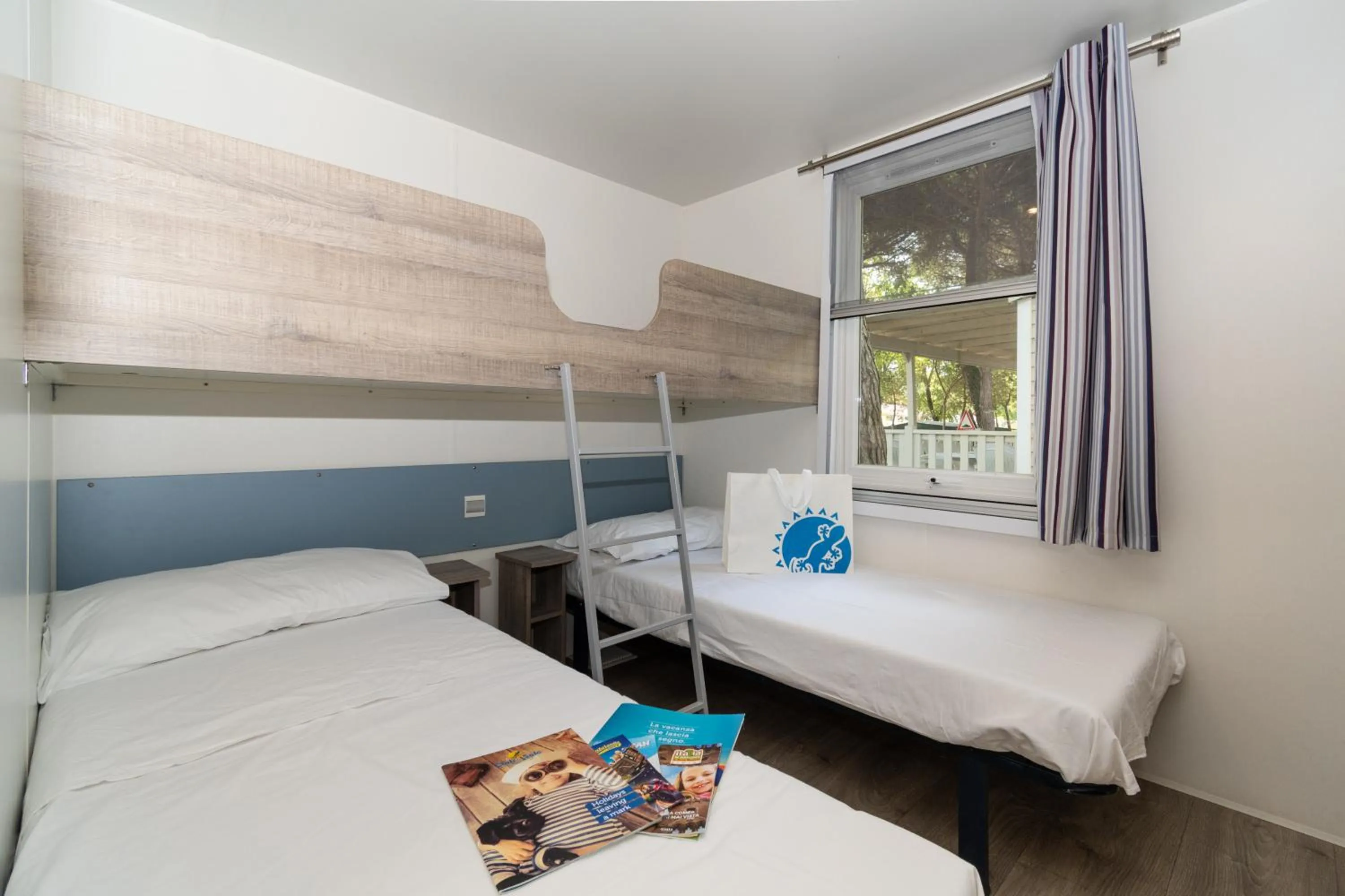 Bed in Club del Sole Adriano Family Camping Village