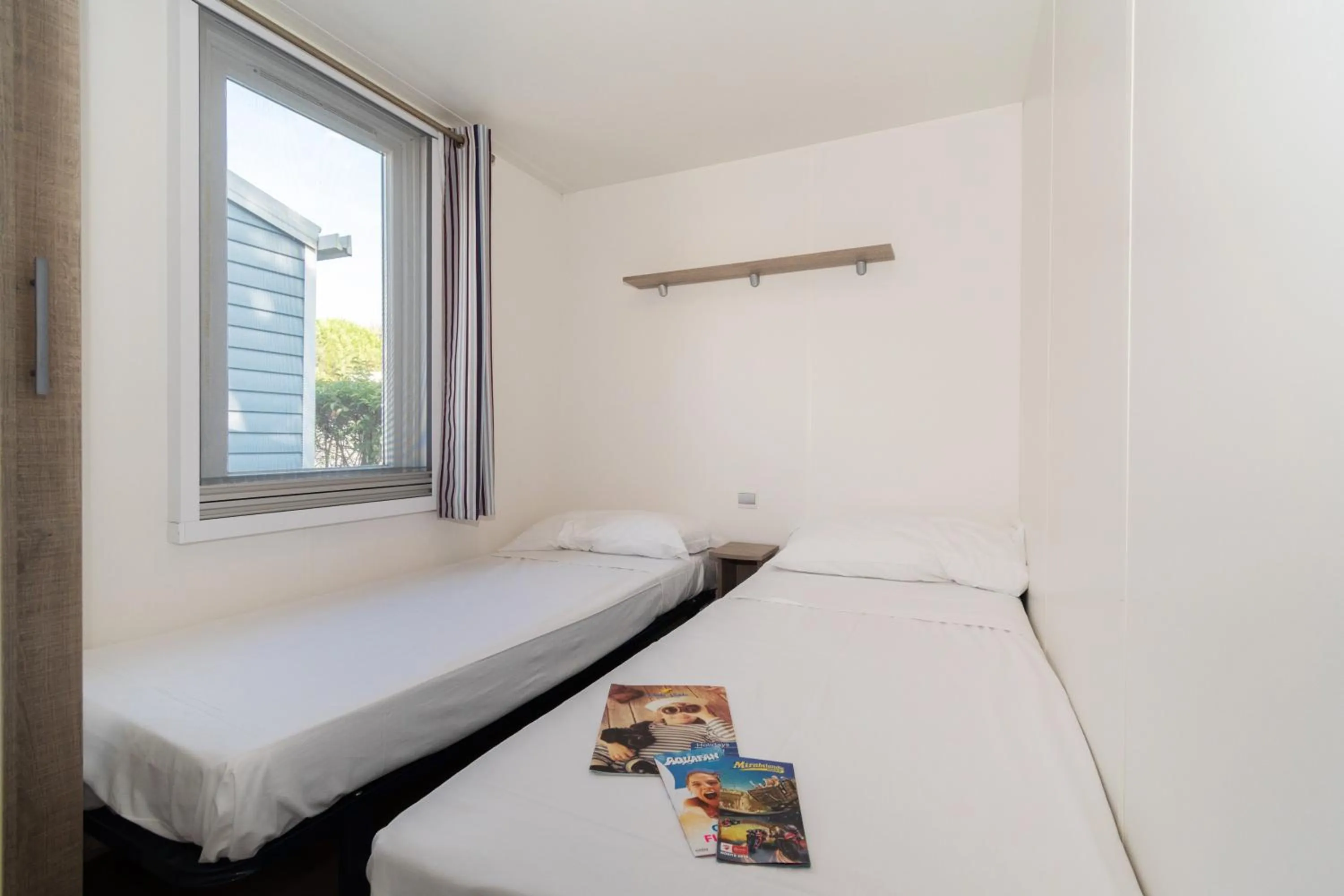 Bed in Club del Sole Adriano Family Camping Village