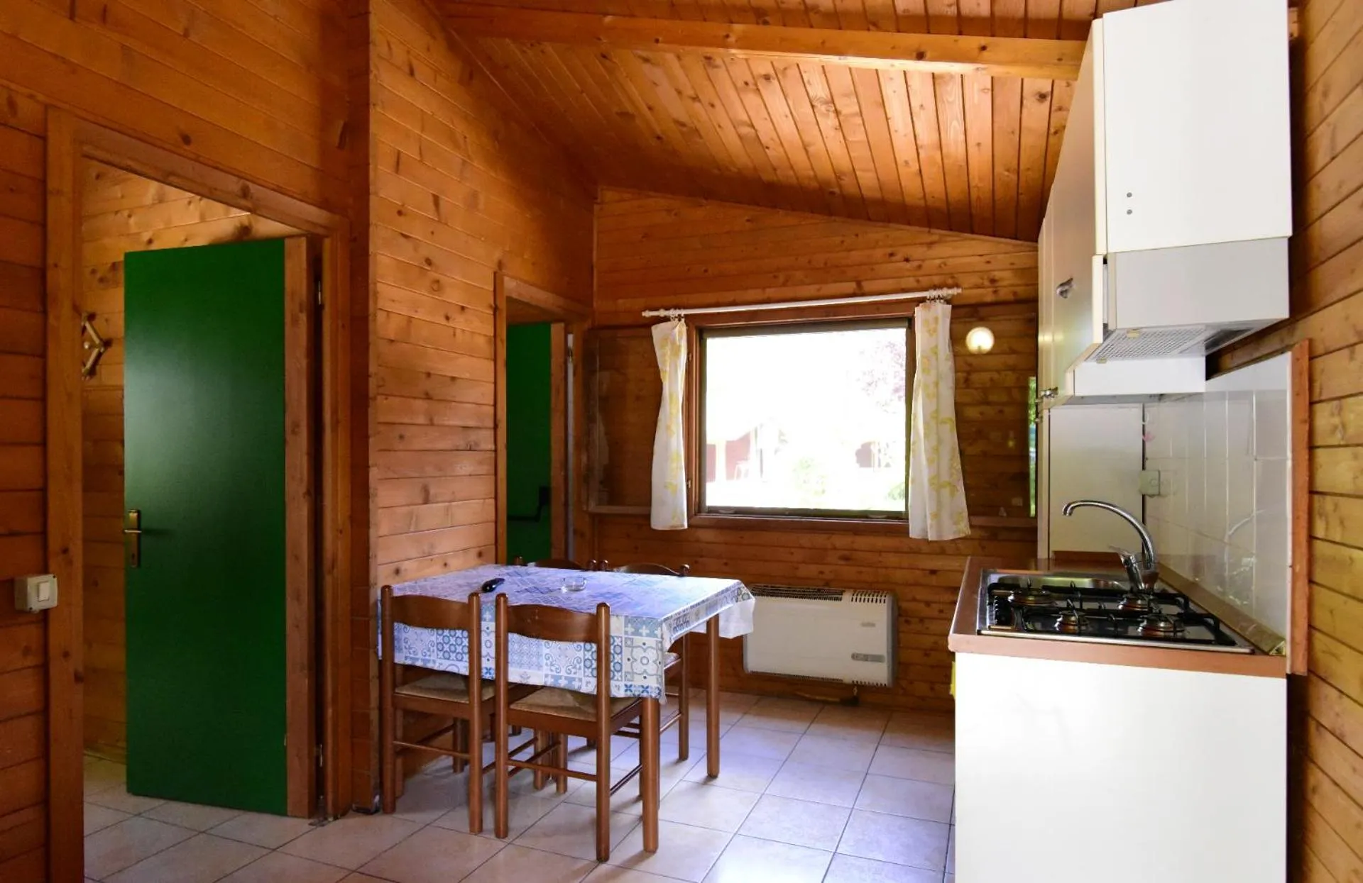Kitchen or kitchenette in Club del Sole Adriano Family Camping Village