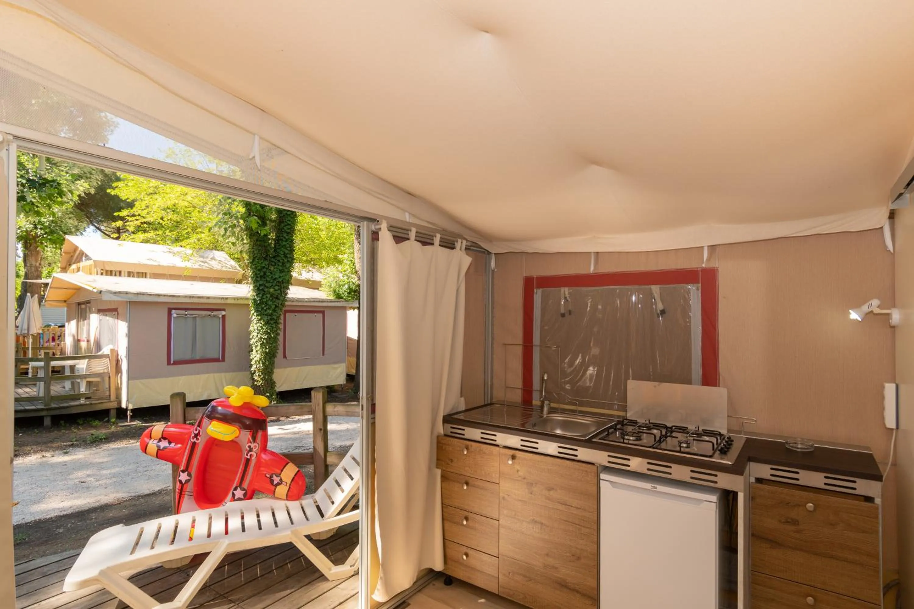 Kitchen or kitchenette in Club del Sole Adriano Family Camping Village