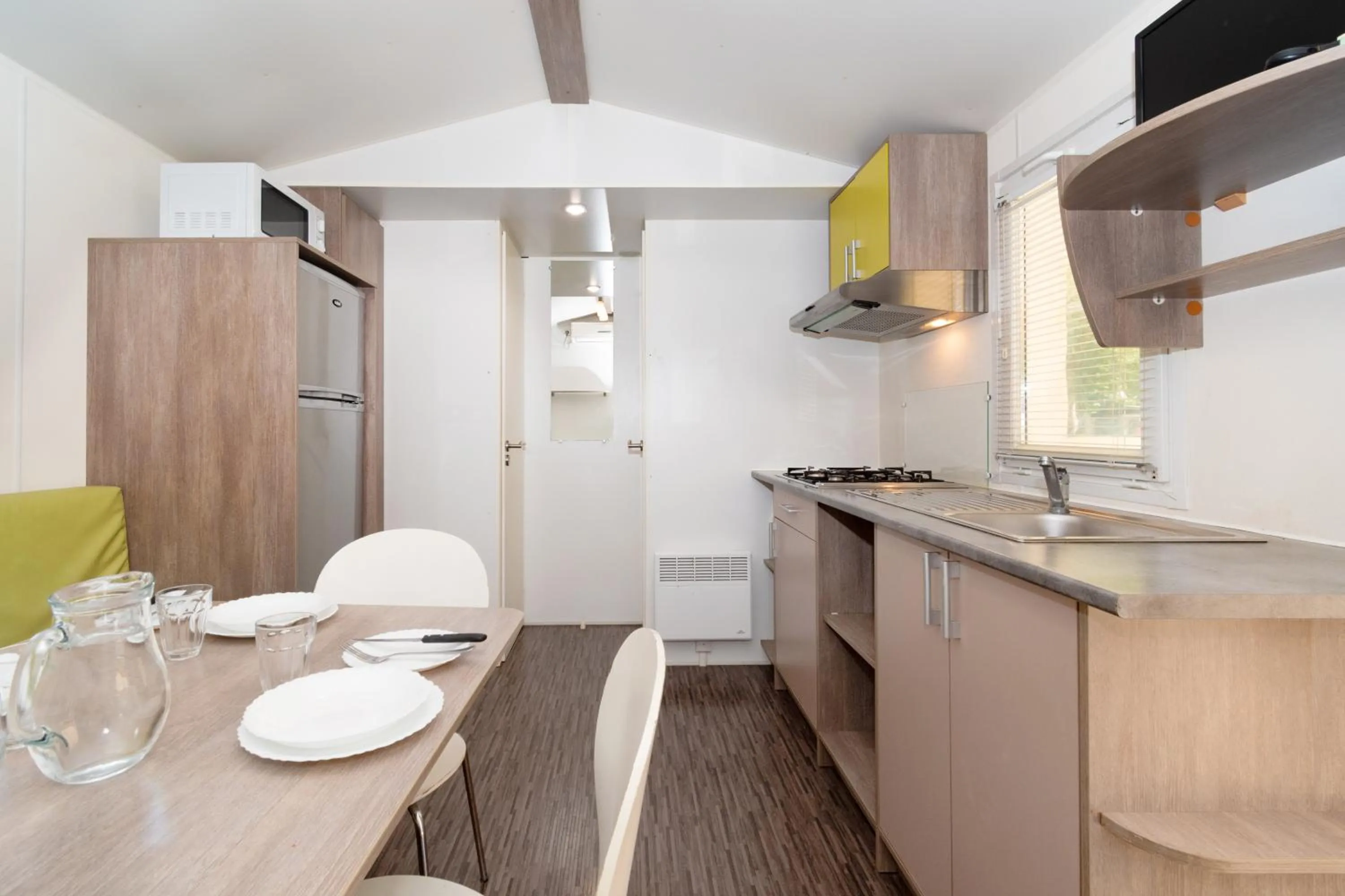 Kitchen or kitchenette in Club del Sole Adriano Family Camping Village