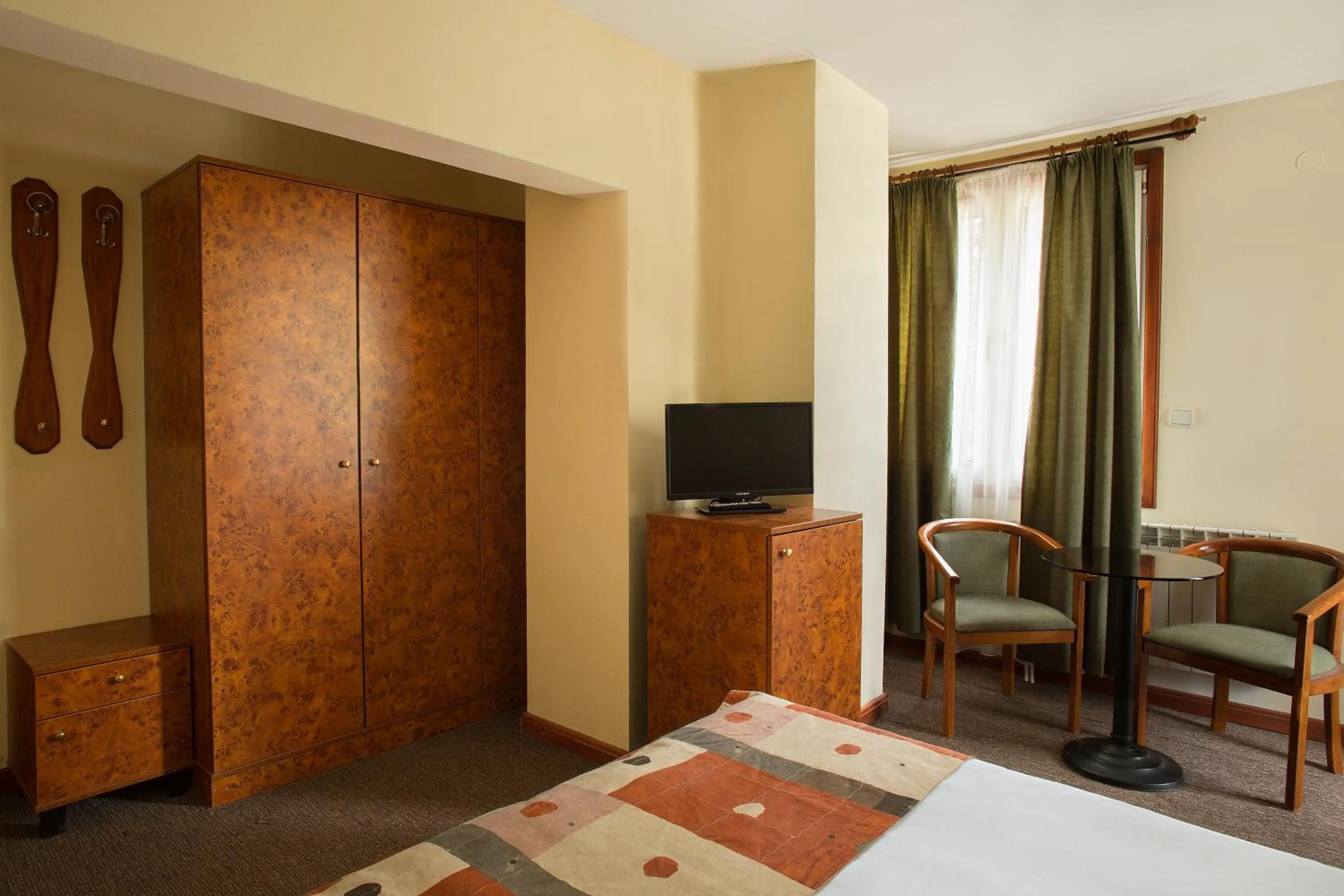 Seating area, Bed in Victoria Hotel Borovets - Free Parking