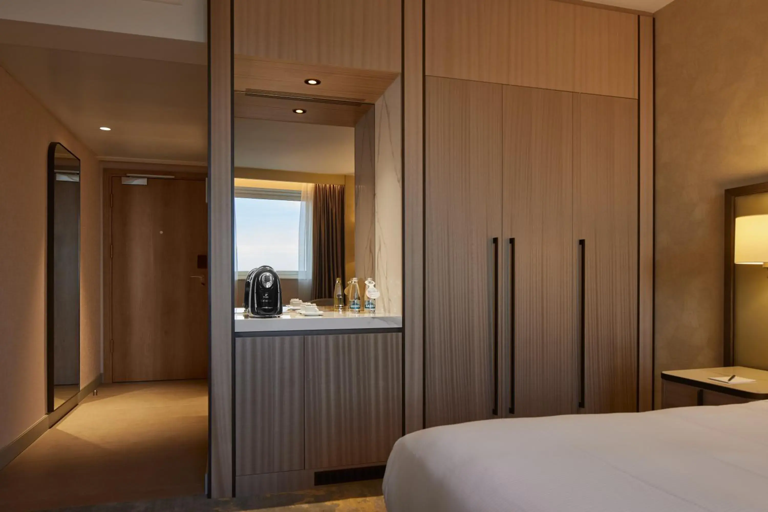 Coffee/tea facilities, Bed in Hilton Sofia Coffee/tea facilities, Bed in Hilton Sofia