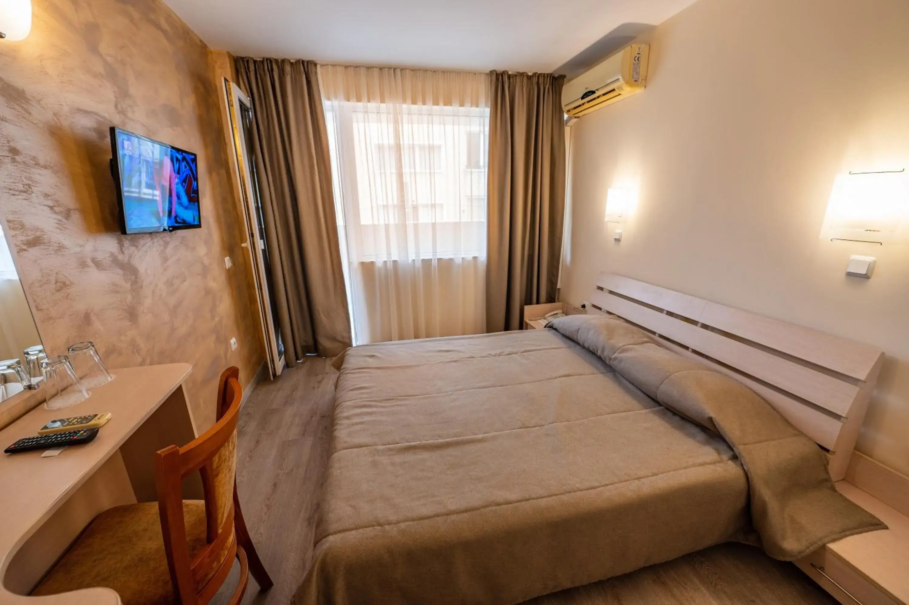 TV and multimedia, Bed in Family Hotel Gran Ivan TV and multimedia, Bed in Family Hotel Gran Ivan