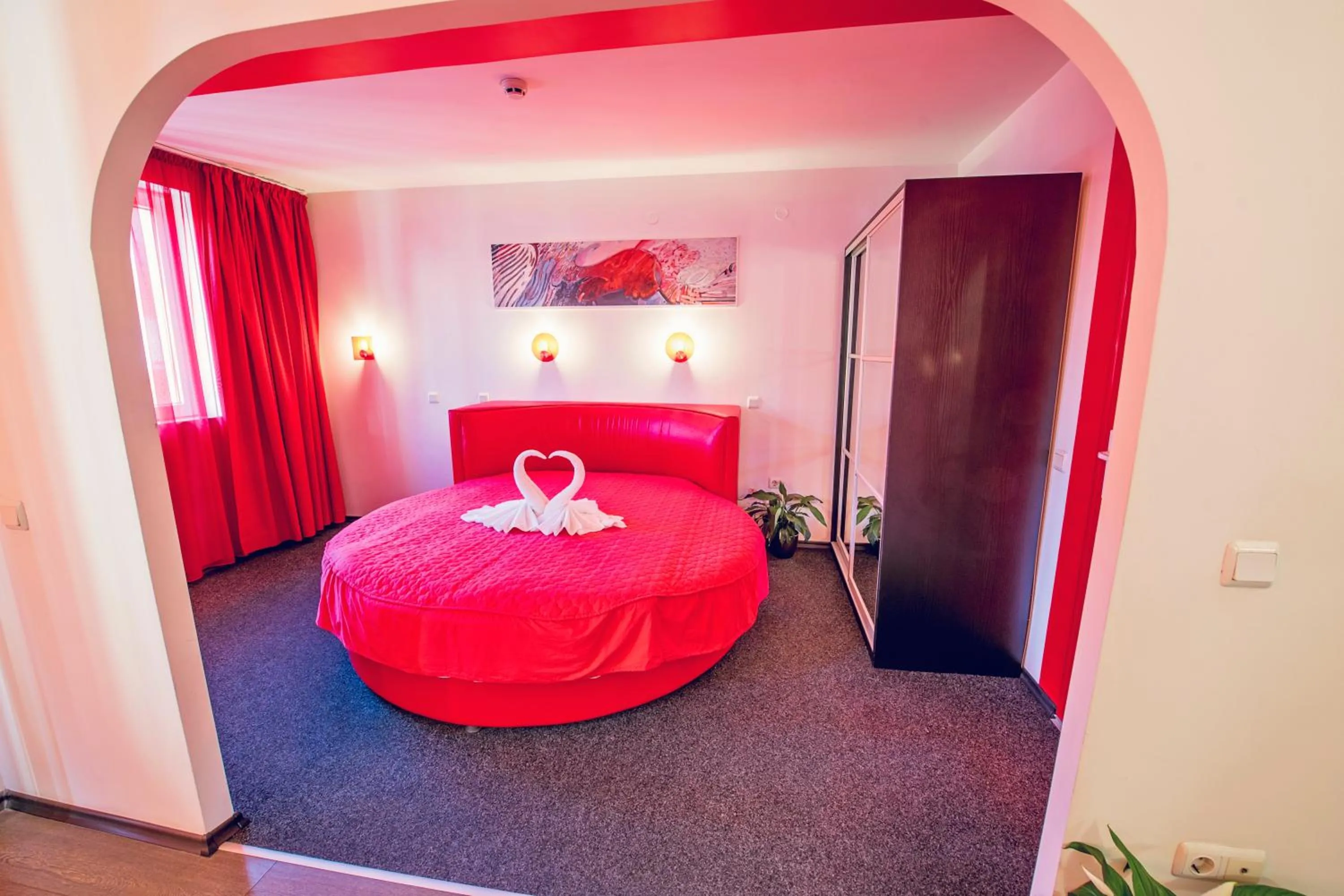 Bed in Family Hotel Gran Ivan