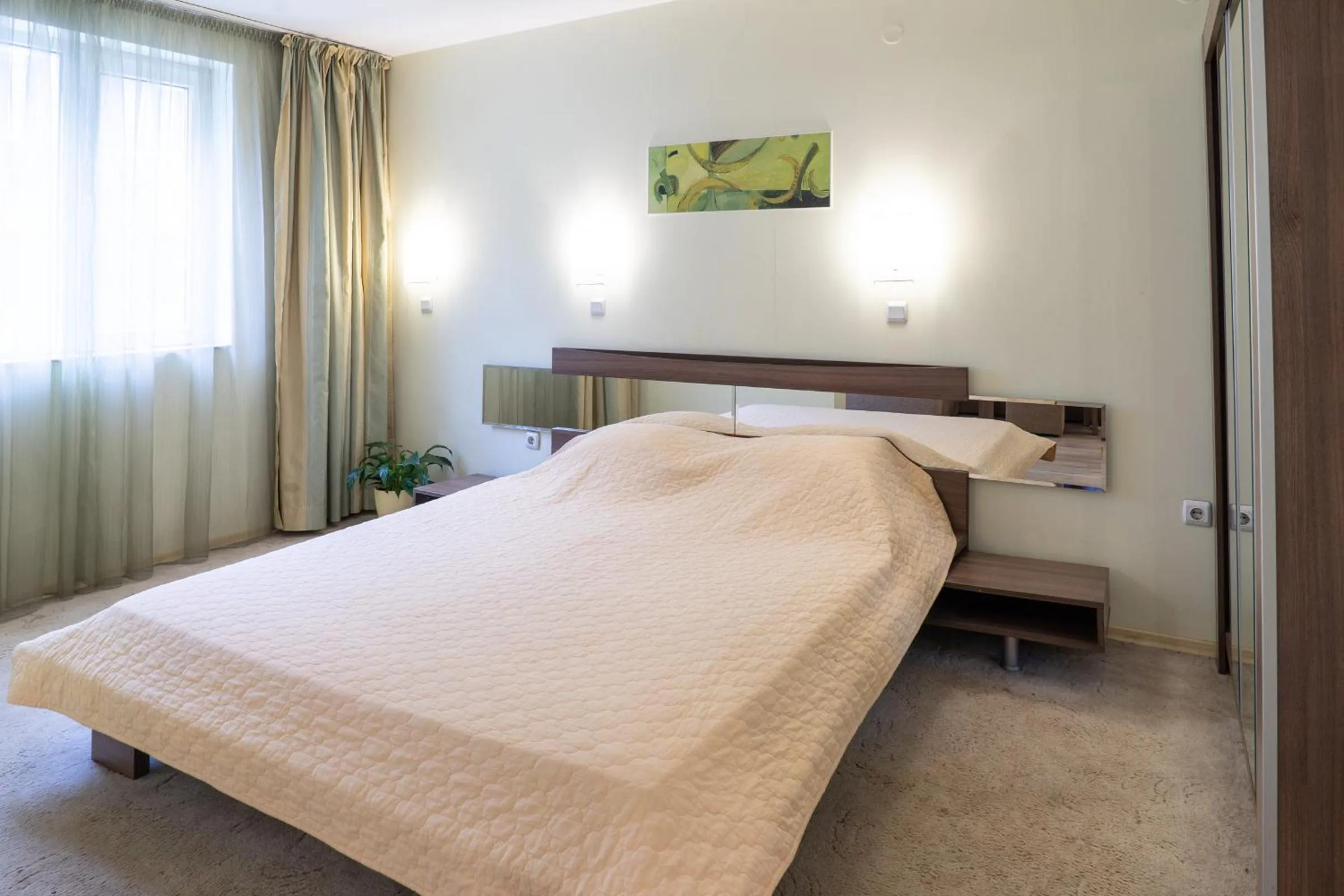 Bed in Family Hotel Gran Ivan