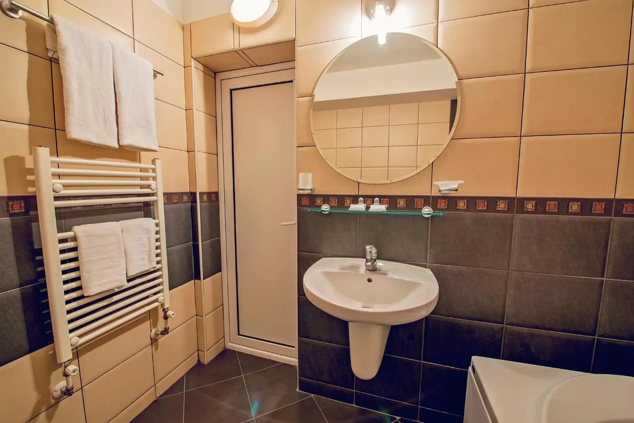 Bathroom in Family Hotel Gran Ivan Bathroom in Family Hotel Gran Ivan