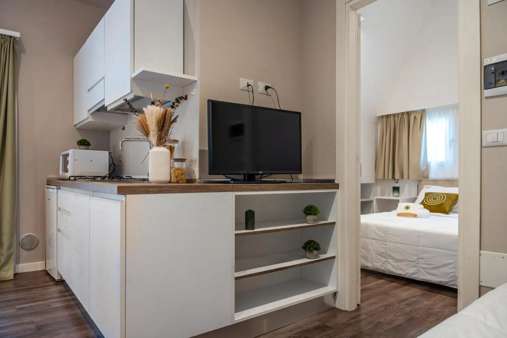 Communal lounge/ TV room, Bed in Club del Sole Spina Family Collection