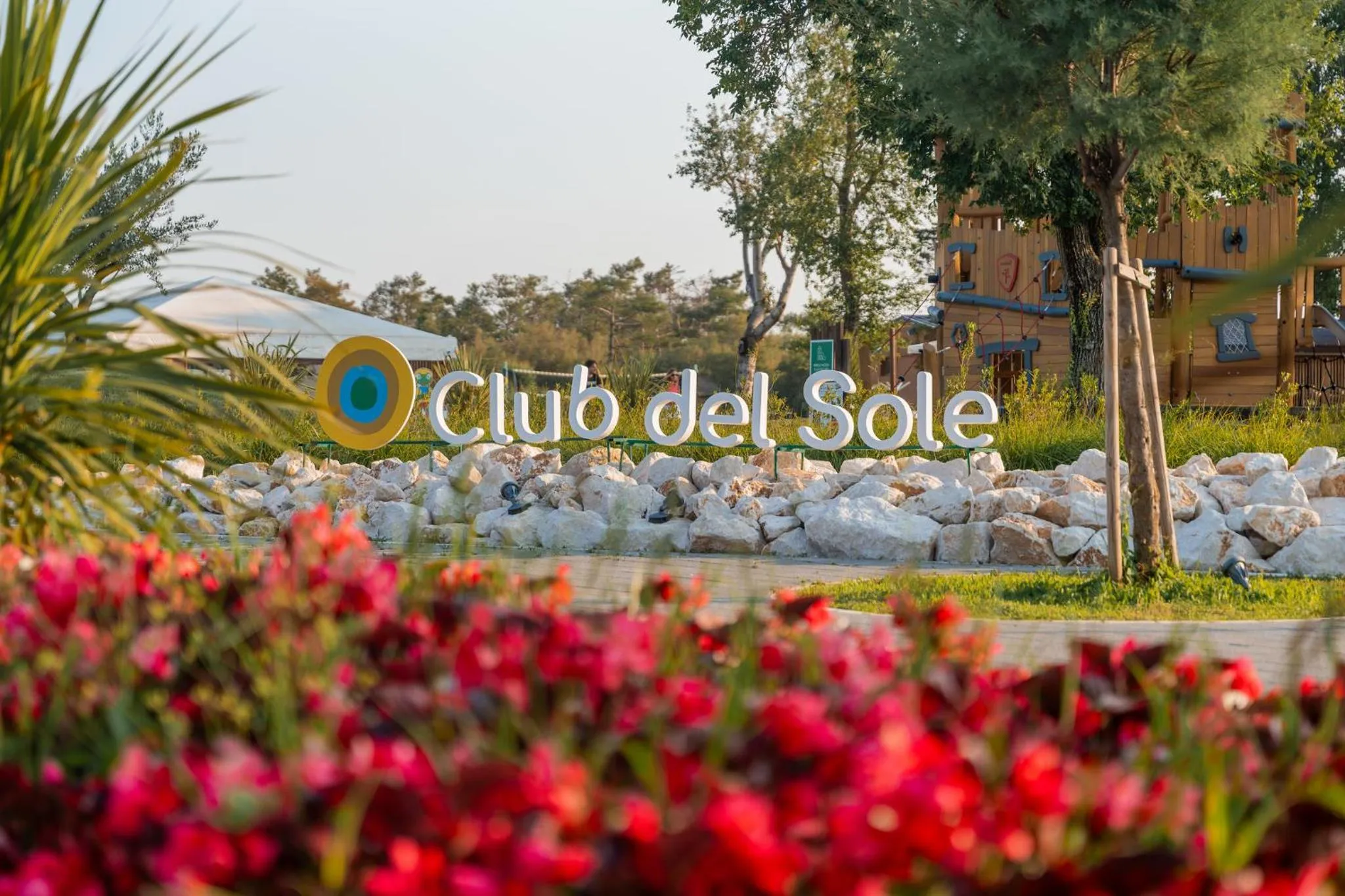 Property logo or sign in Club del Sole Spina Family Collection