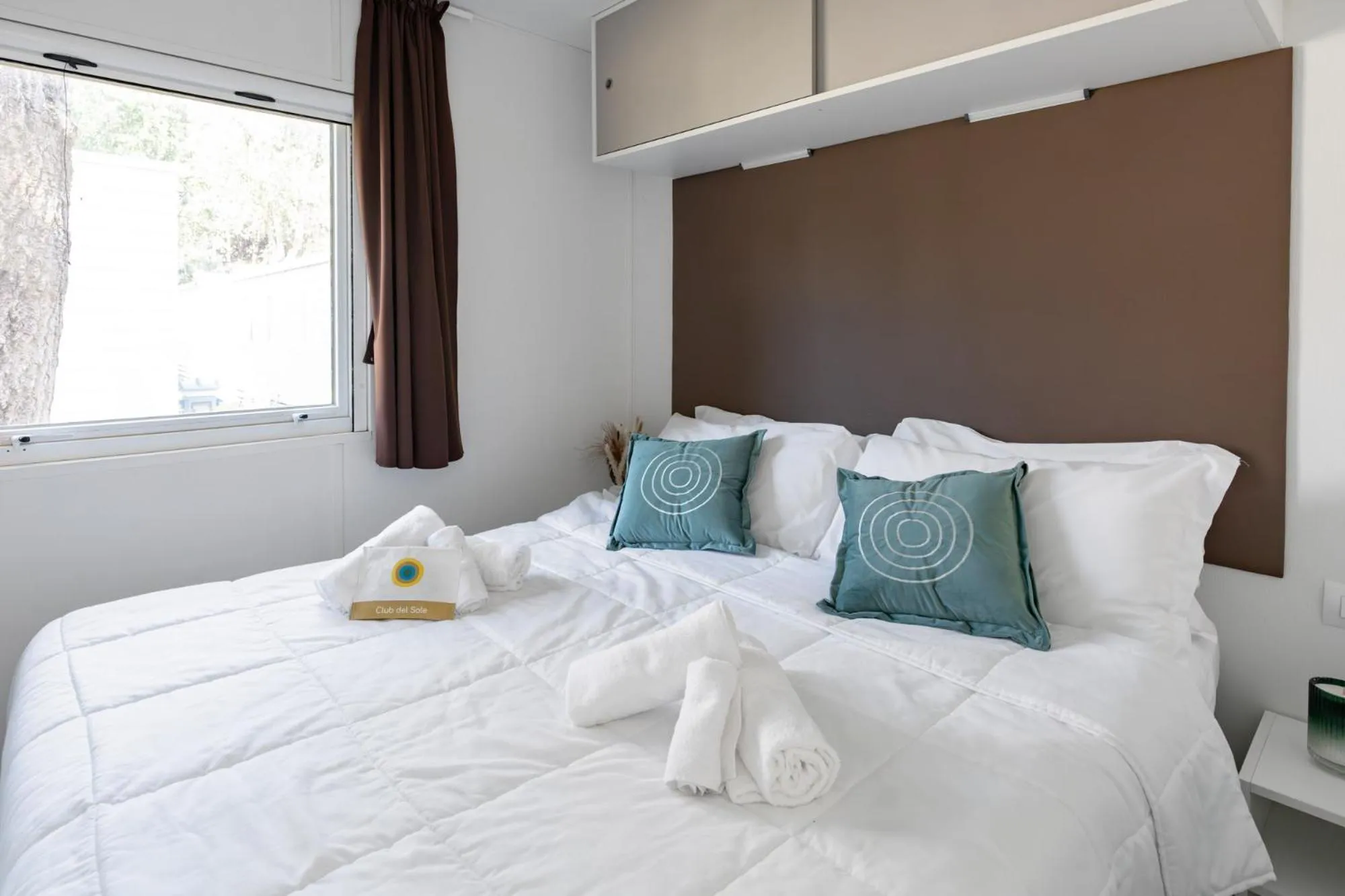 Bed in Club del Sole Spina Family Collection