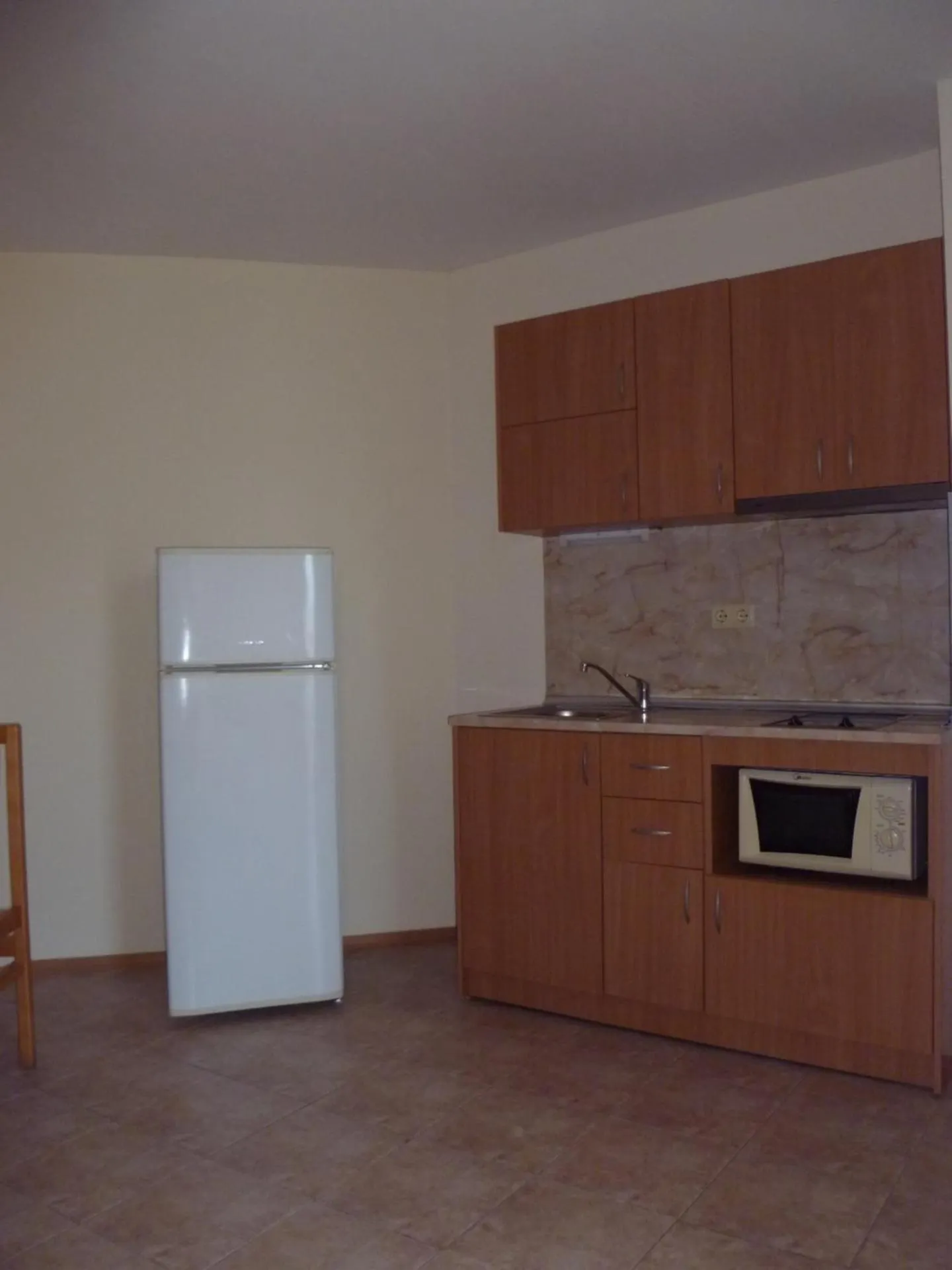 Kitchen or kitchenette in Apartment Tourist Complex Rose Village