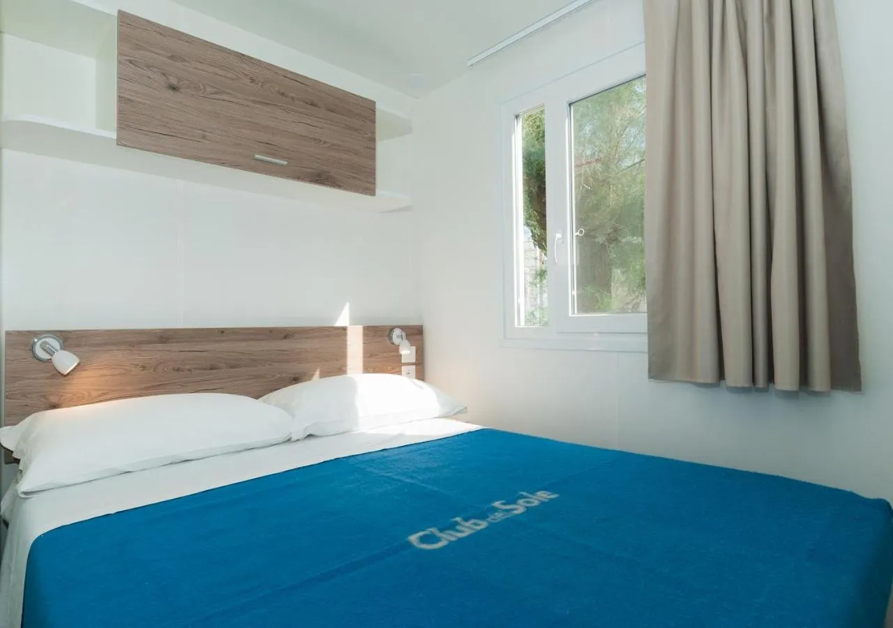 Bed in Club del Sole Vigna sul Mar Family Collection