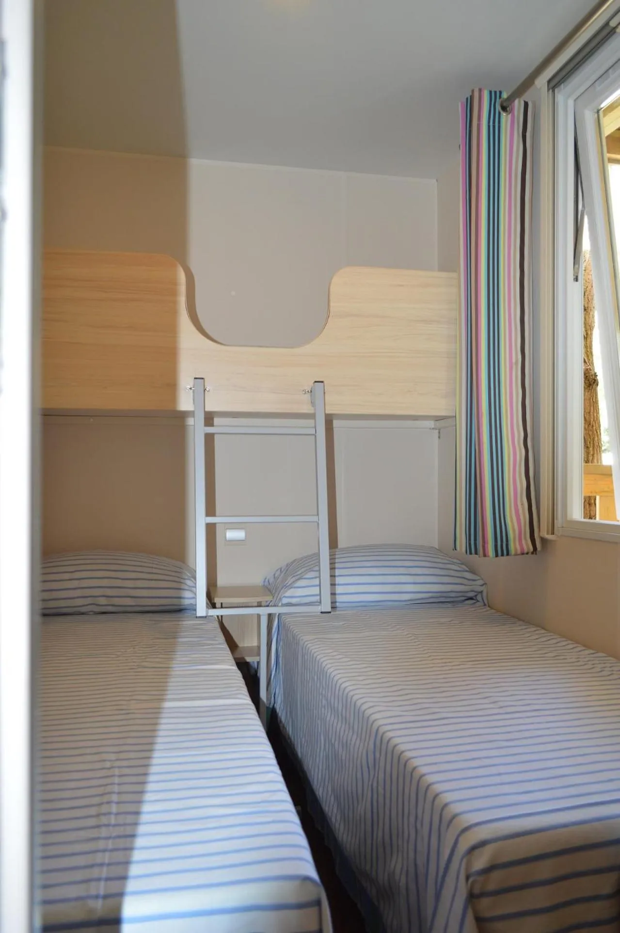 Bed in Club del Sole Vigna sul Mar Family Collection