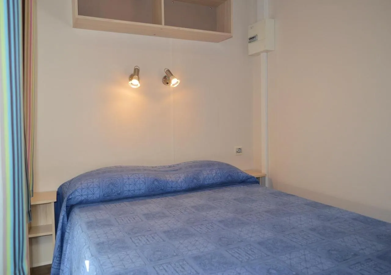 Bed in Club del Sole Vigna sul Mar Family Collection