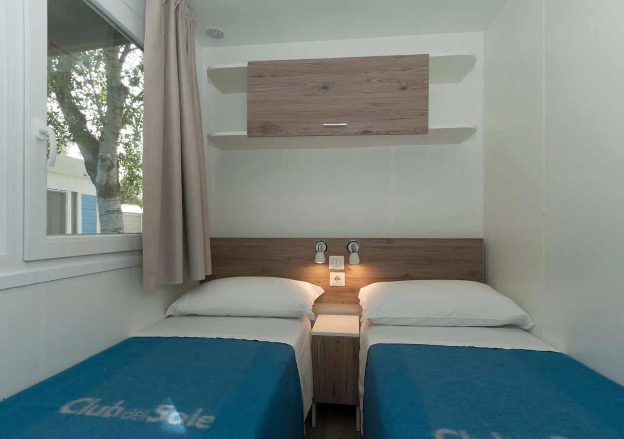 Bed in Club del Sole Vigna sul Mar Family Collection