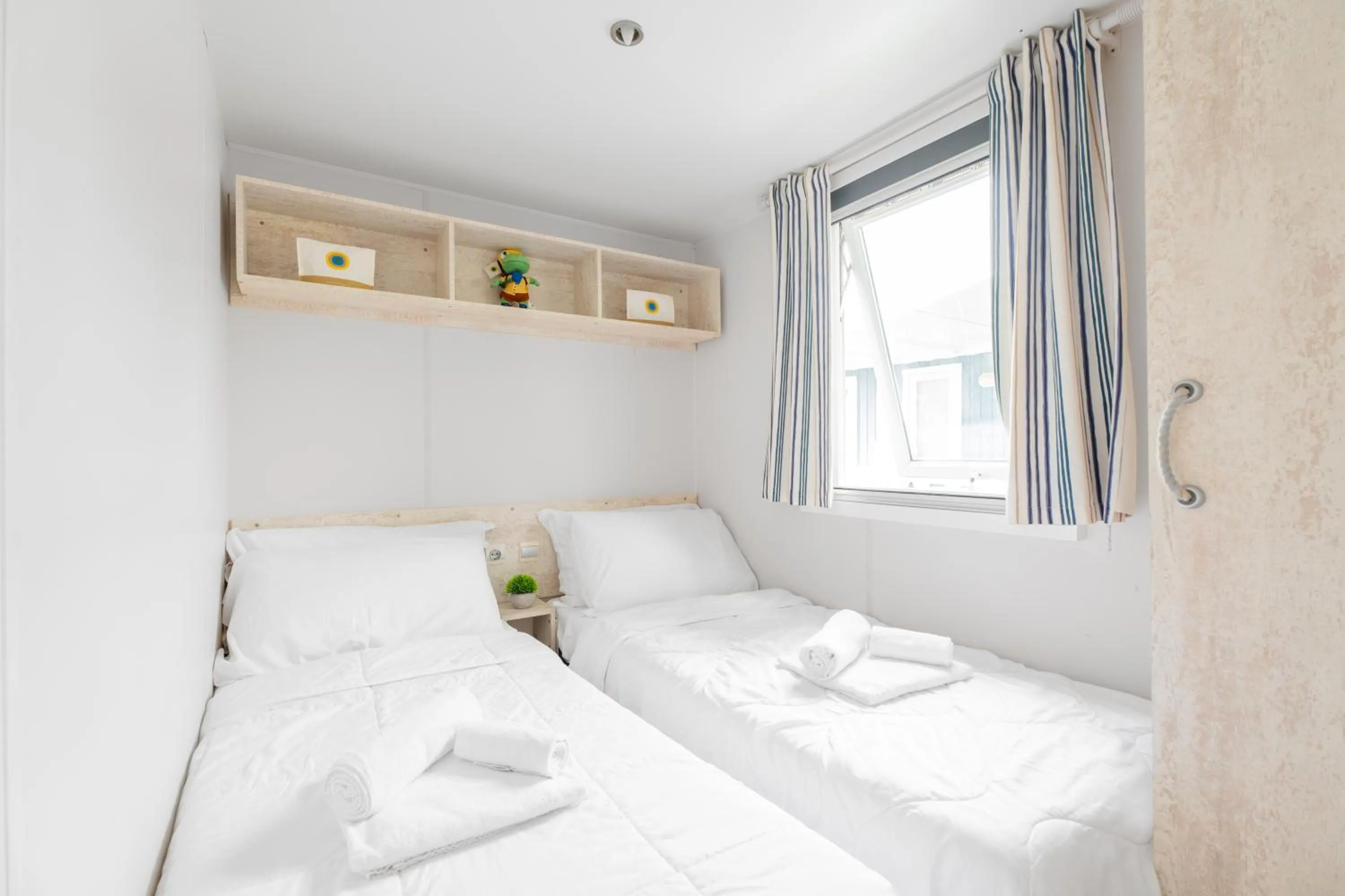 Bed in Club del Sole Vigna sul Mar Family Collection