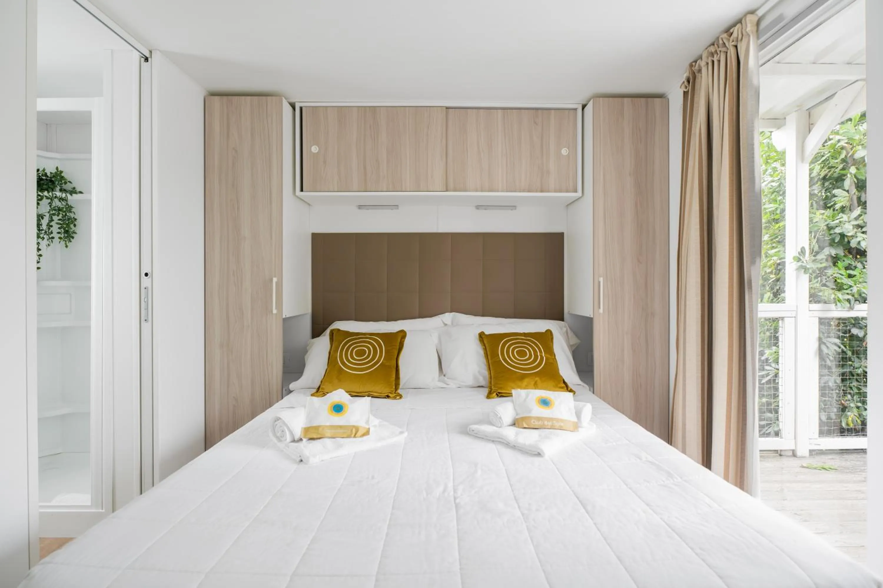 Bed in Club del Sole Vigna sul Mar Family Collection