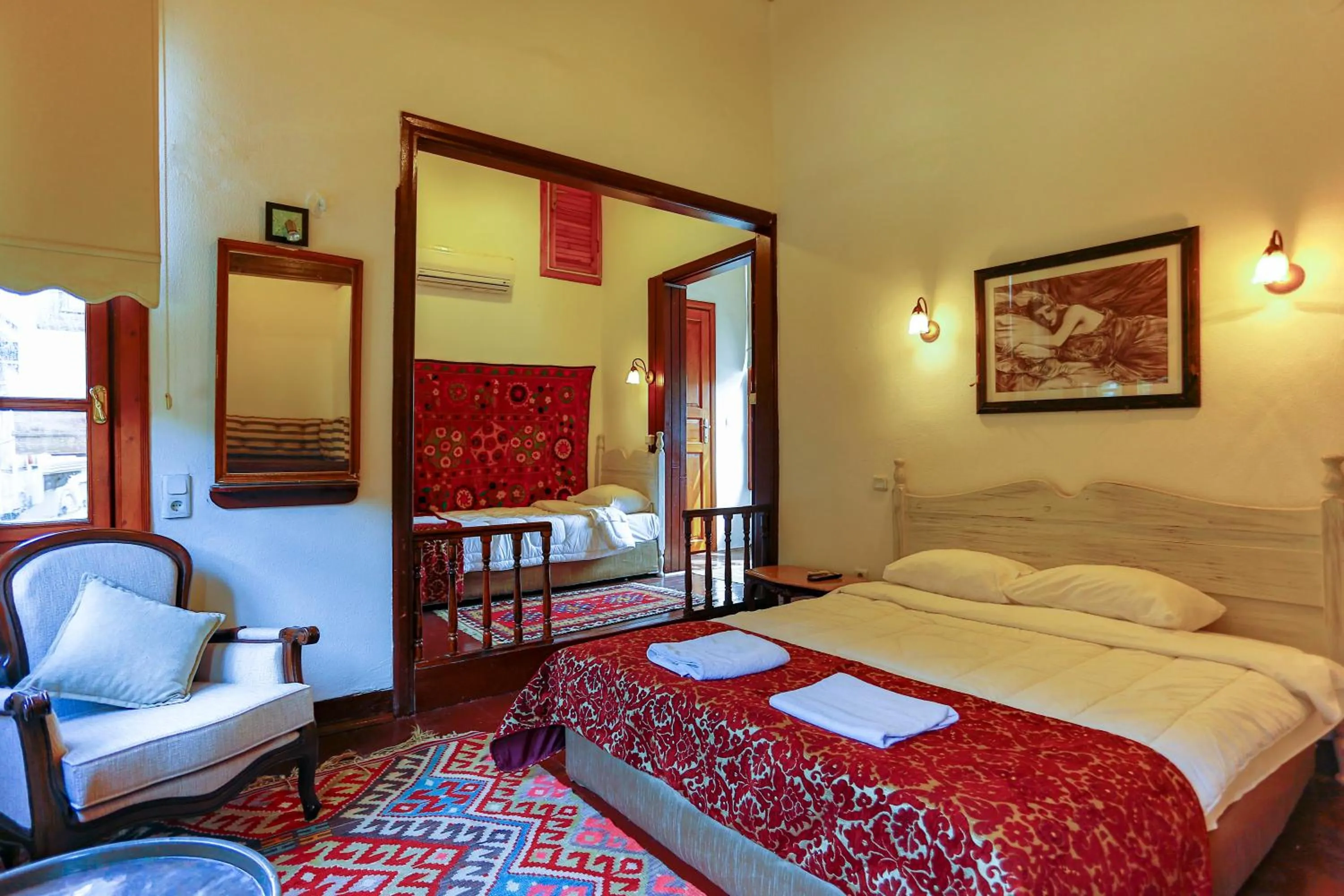 Bed in Atelya Art Hotel