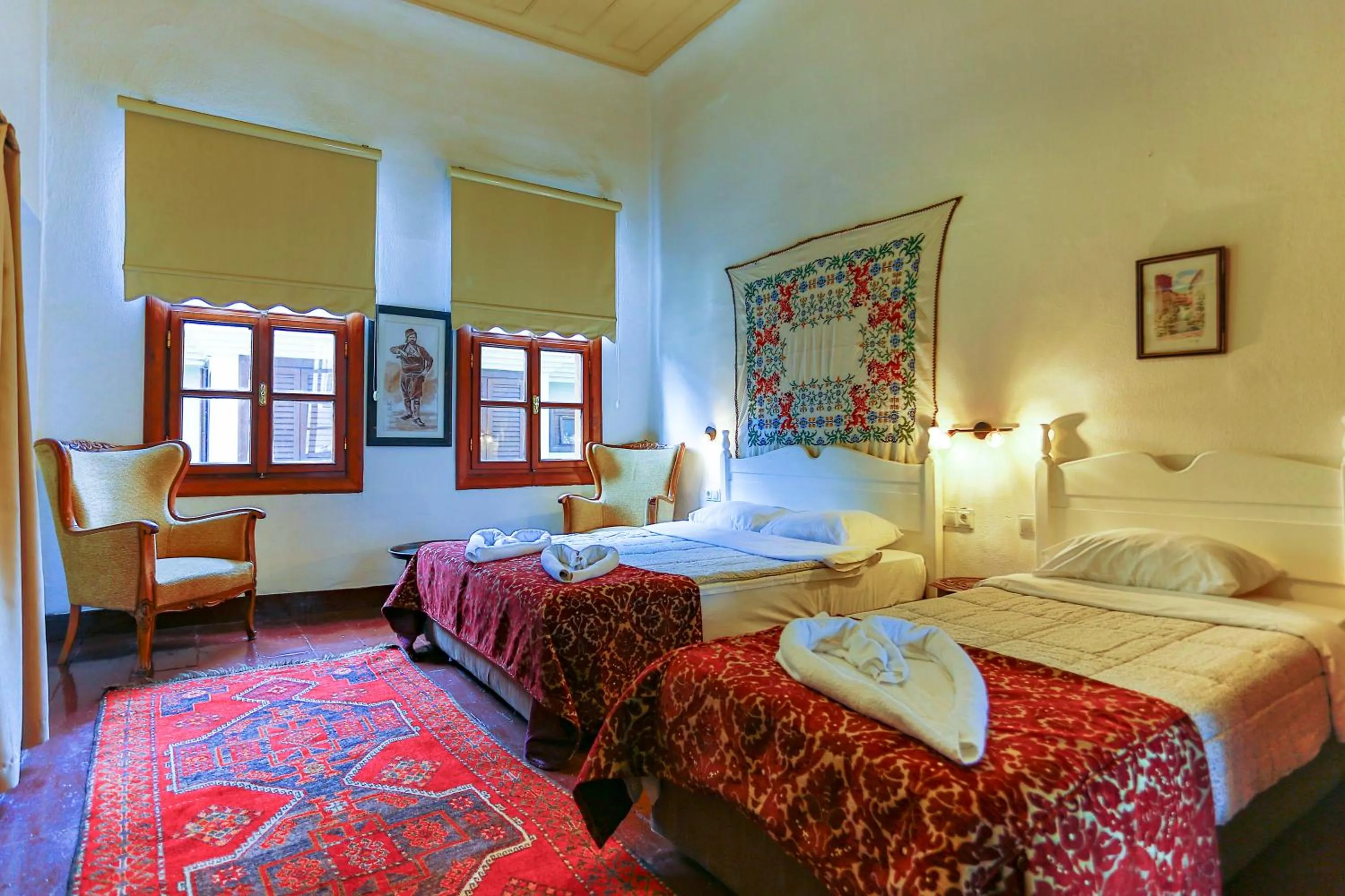 Bed in Atelya Art Hotel