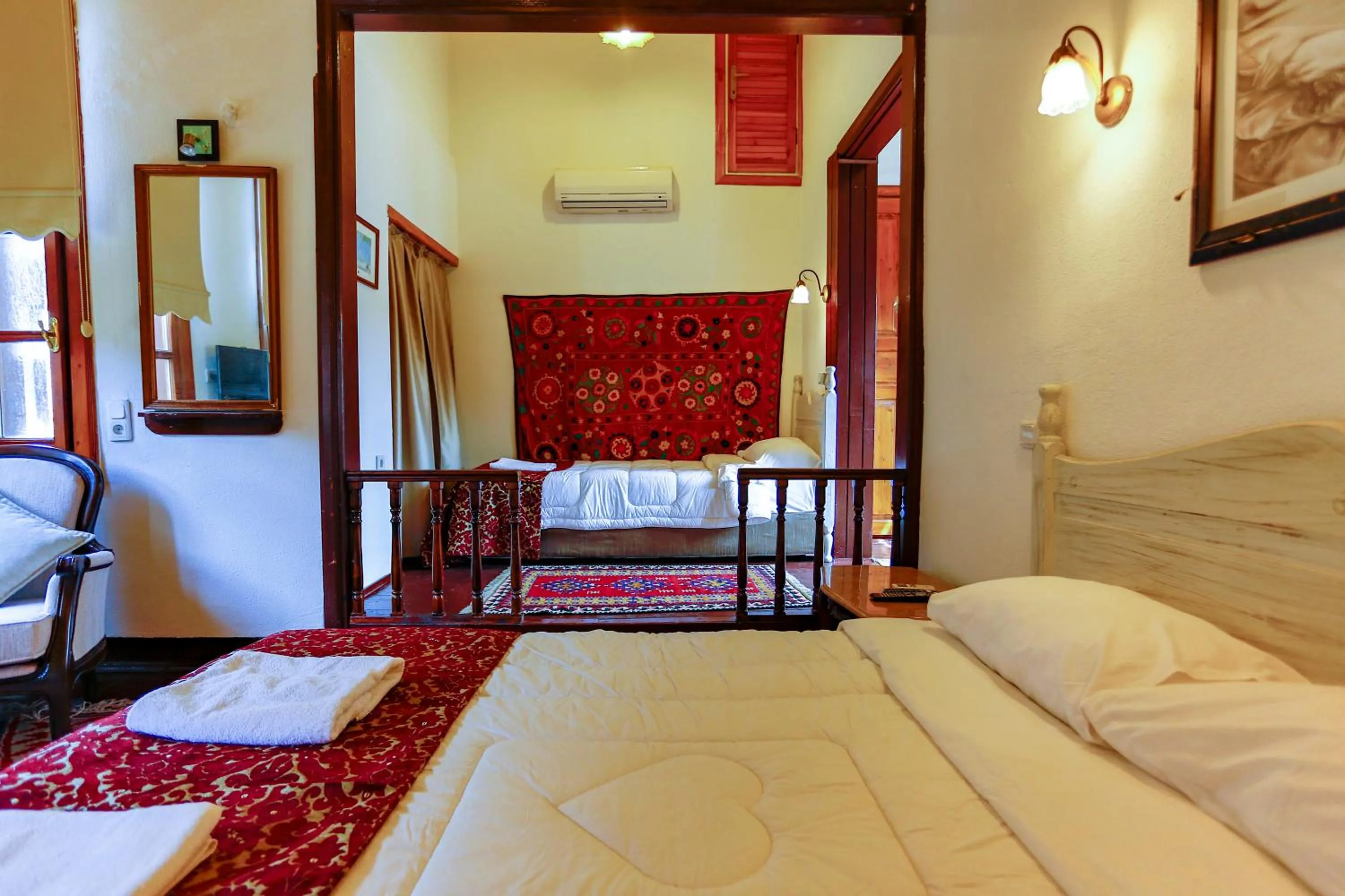 Bed in Atelya Art Hotel