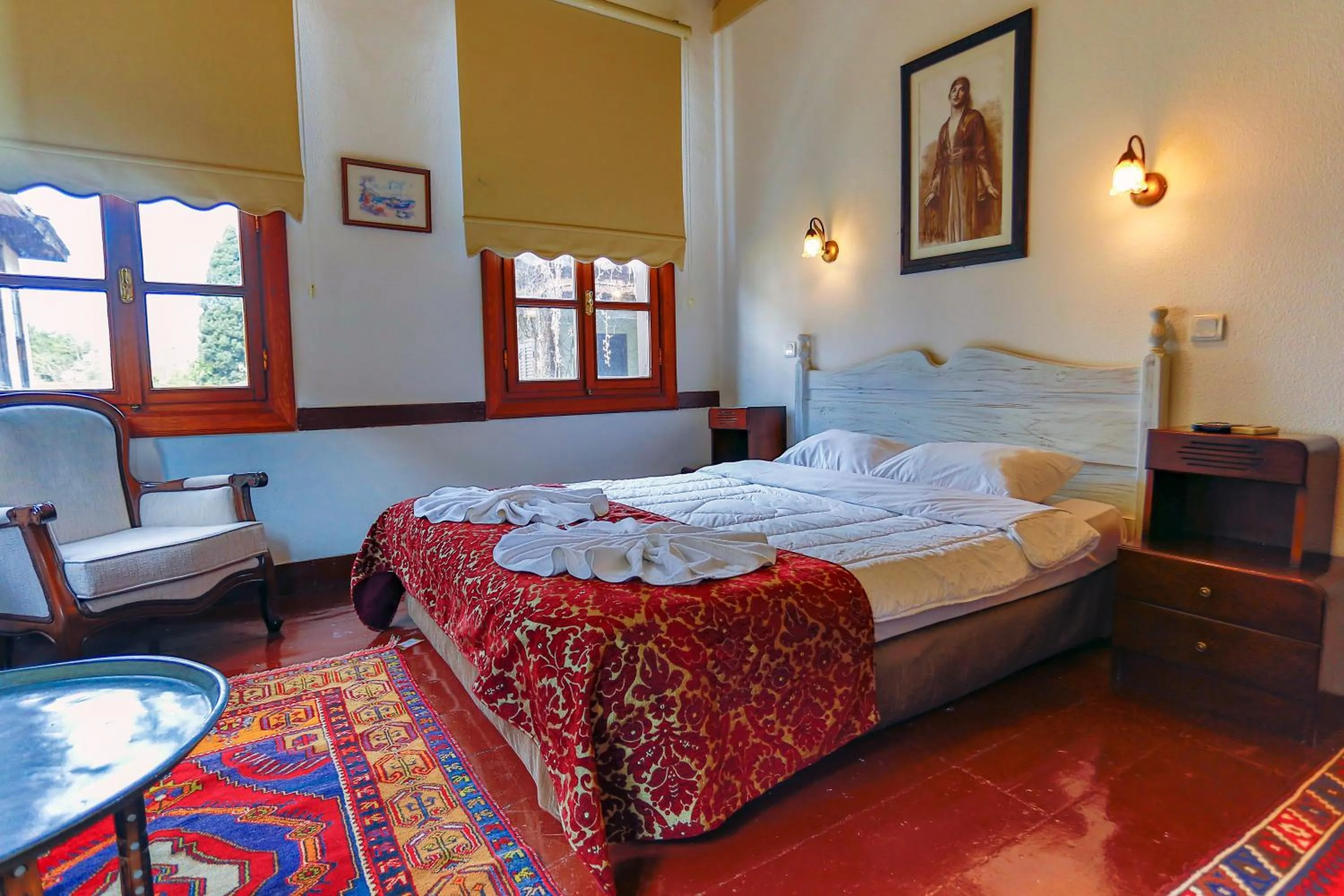 Bed in Atelya Art Hotel