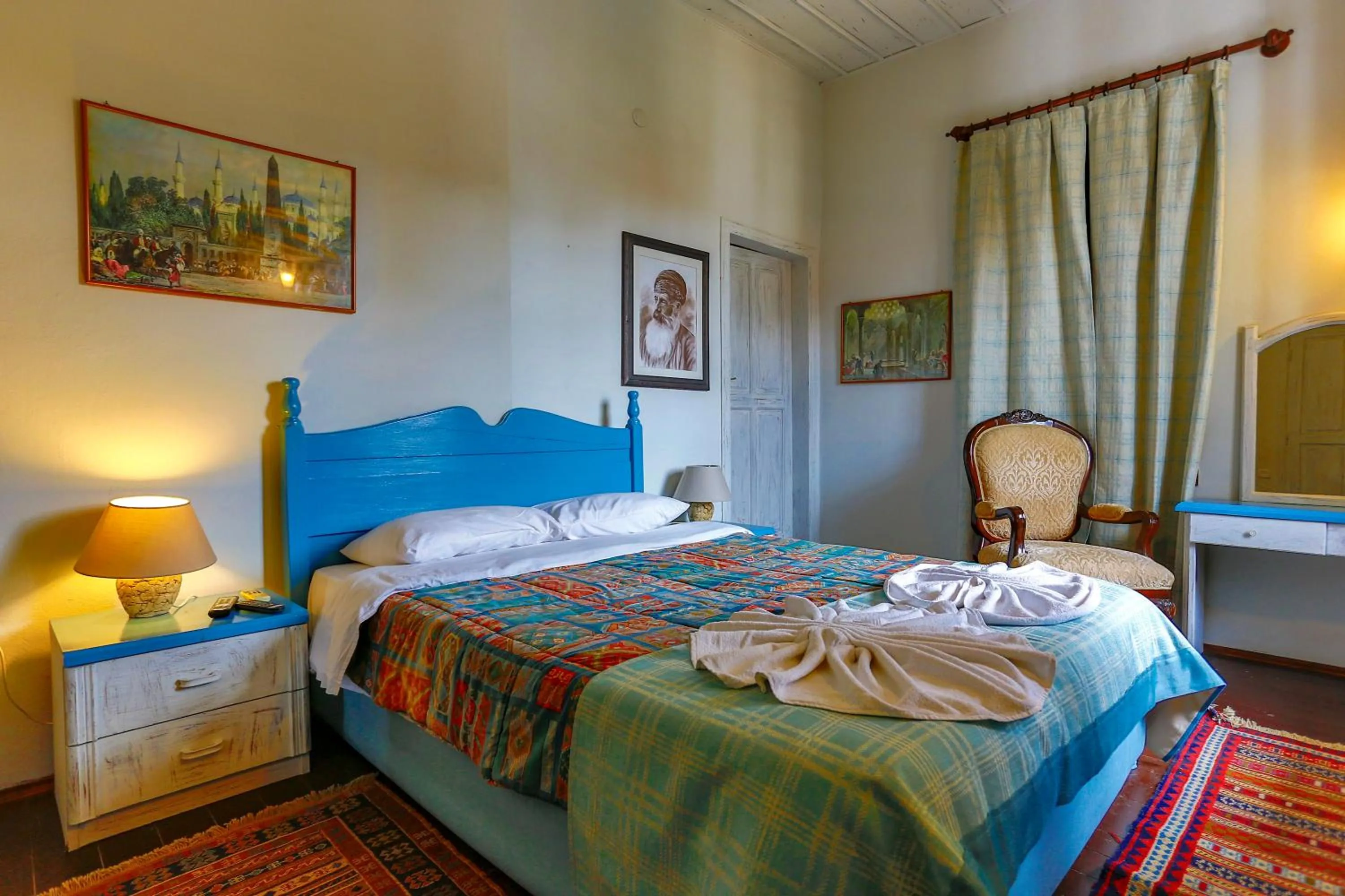 Bed in Atelya Art Hotel