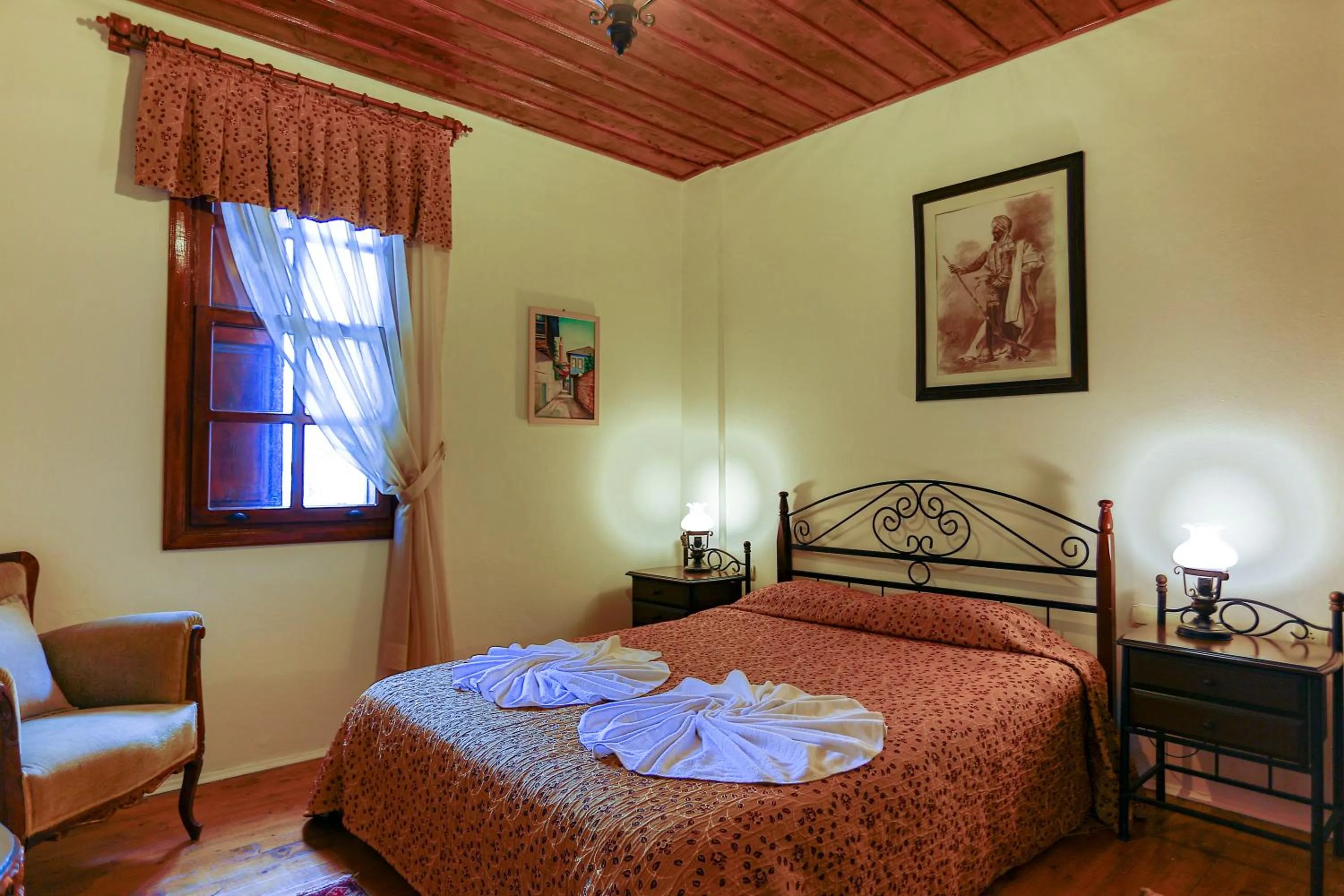 Bed in Atelya Art Hotel