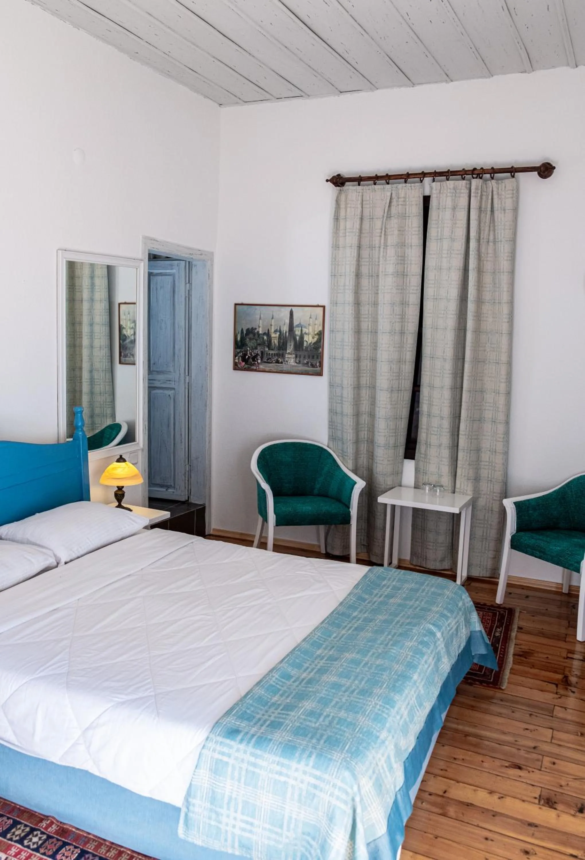 Bed in Atelya Art Hotel