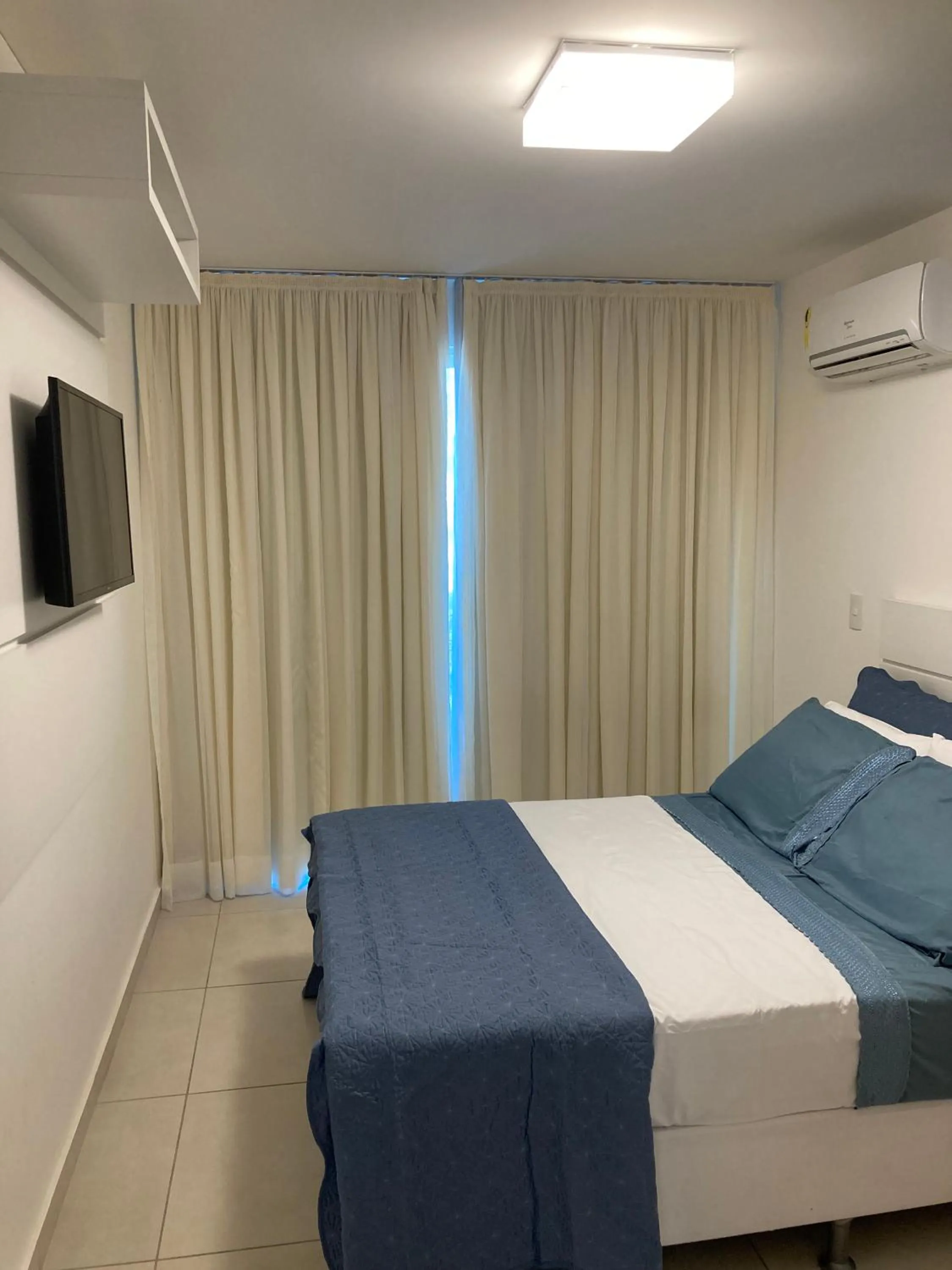 Bed in Apartamento Super Luxo em Arraial do Cabo