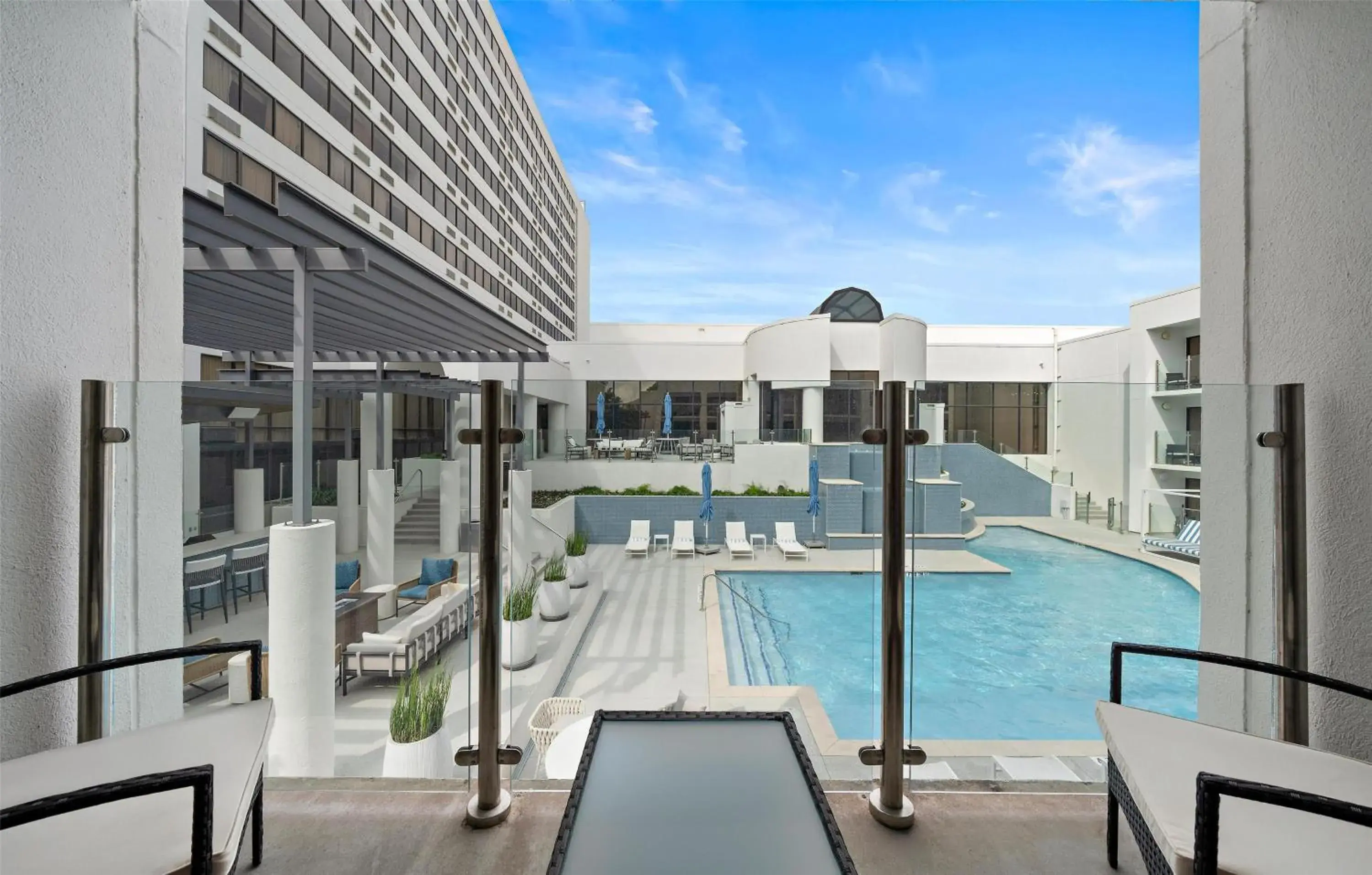 Queen Room with Two Queen Beds and Poolside View in Hilton College Station & Conference Center Queen Room with Two Queen Beds and Poolside View in Hilton College Station & Conference Center