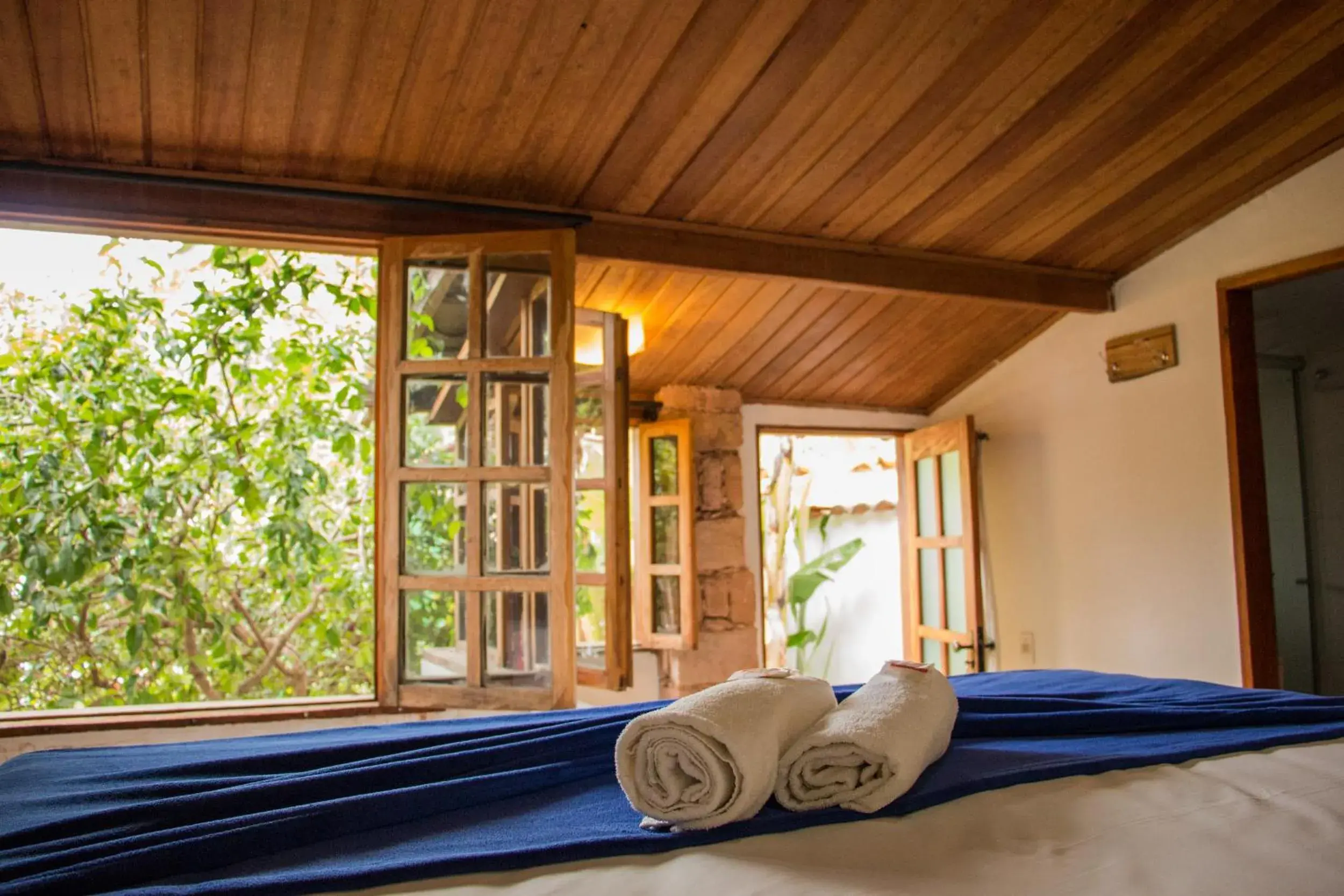 Triple Room with Garden View in Pouso da Trilha Hospedagem Triple Room with Garden View in Pouso da Trilha Hospedagem