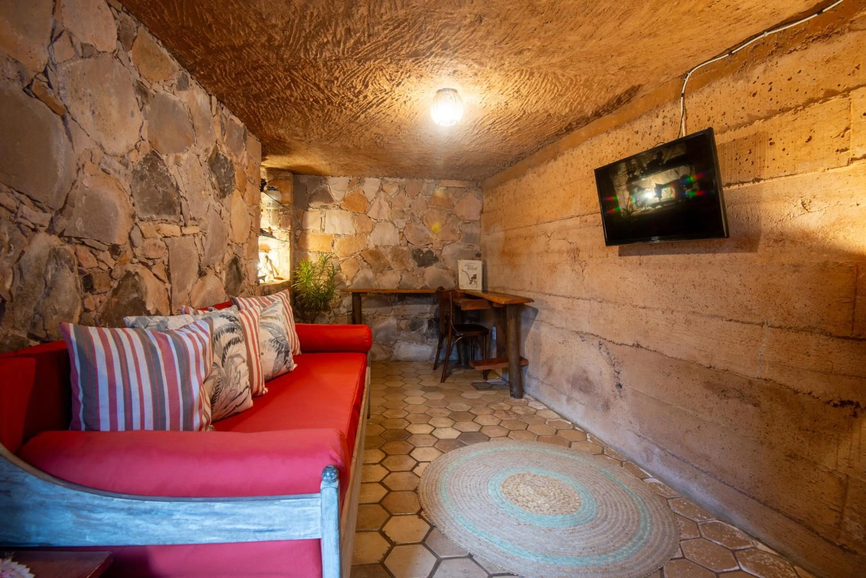 Communal lounge/ TV room in Pouso da Trilha Hospedagem