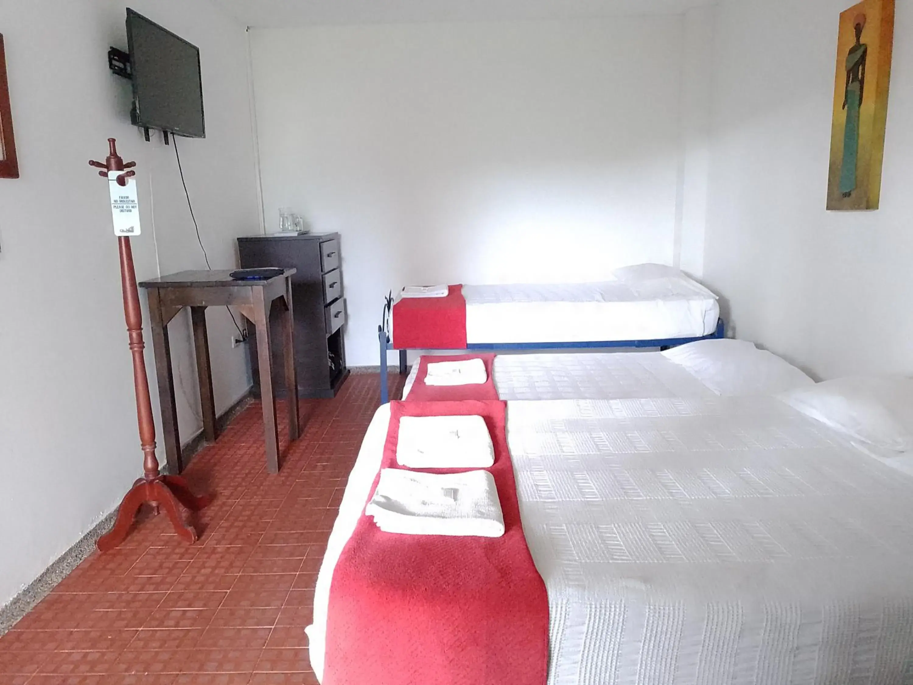 Quadruple Room in Hotel Villa Carolina Quadruple Room in Hotel Villa Carolina
