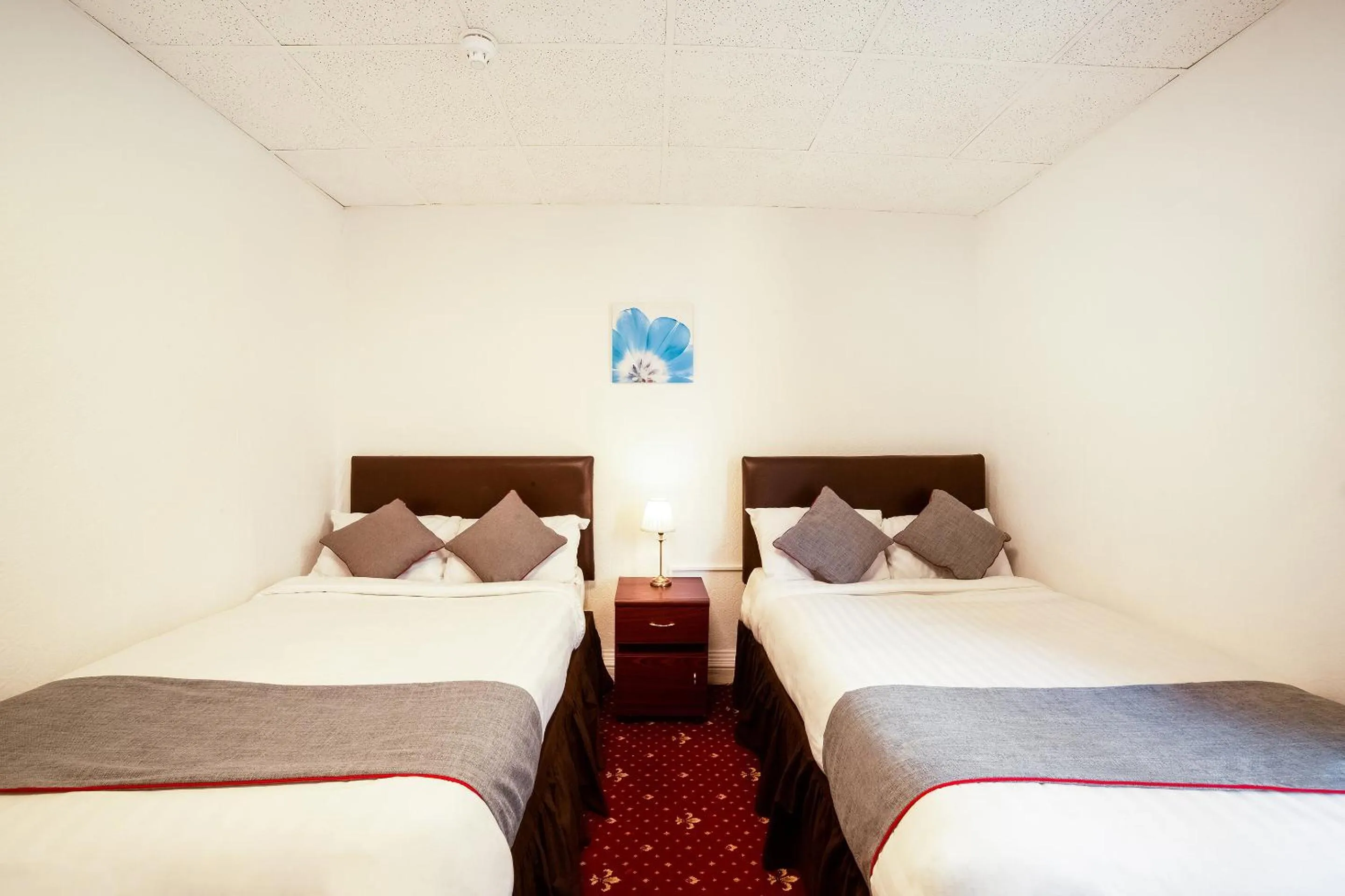 Bedroom in OYO The Golden Cheval Hotel