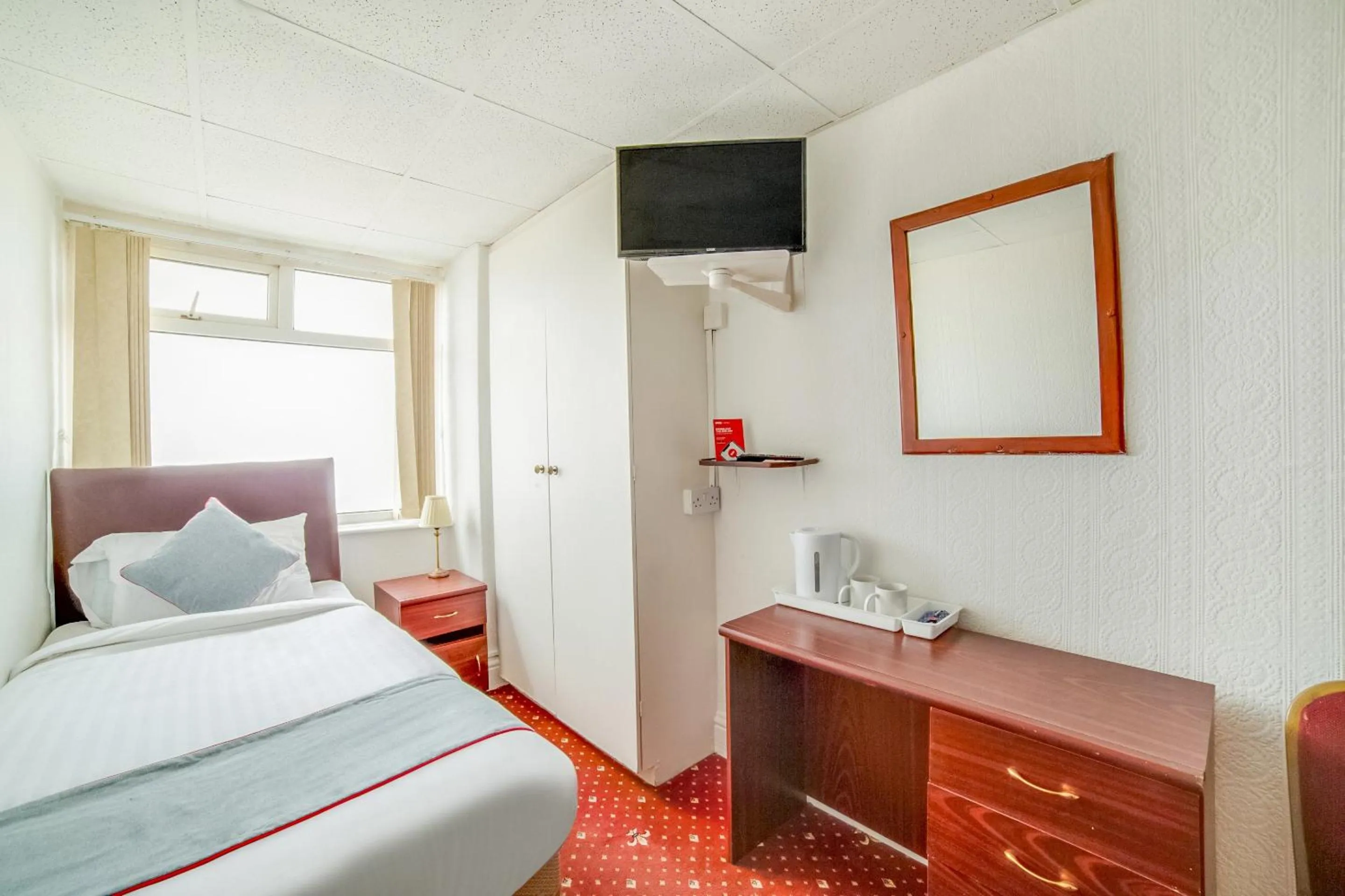 Bedroom in OYO The Golden Cheval Hotel