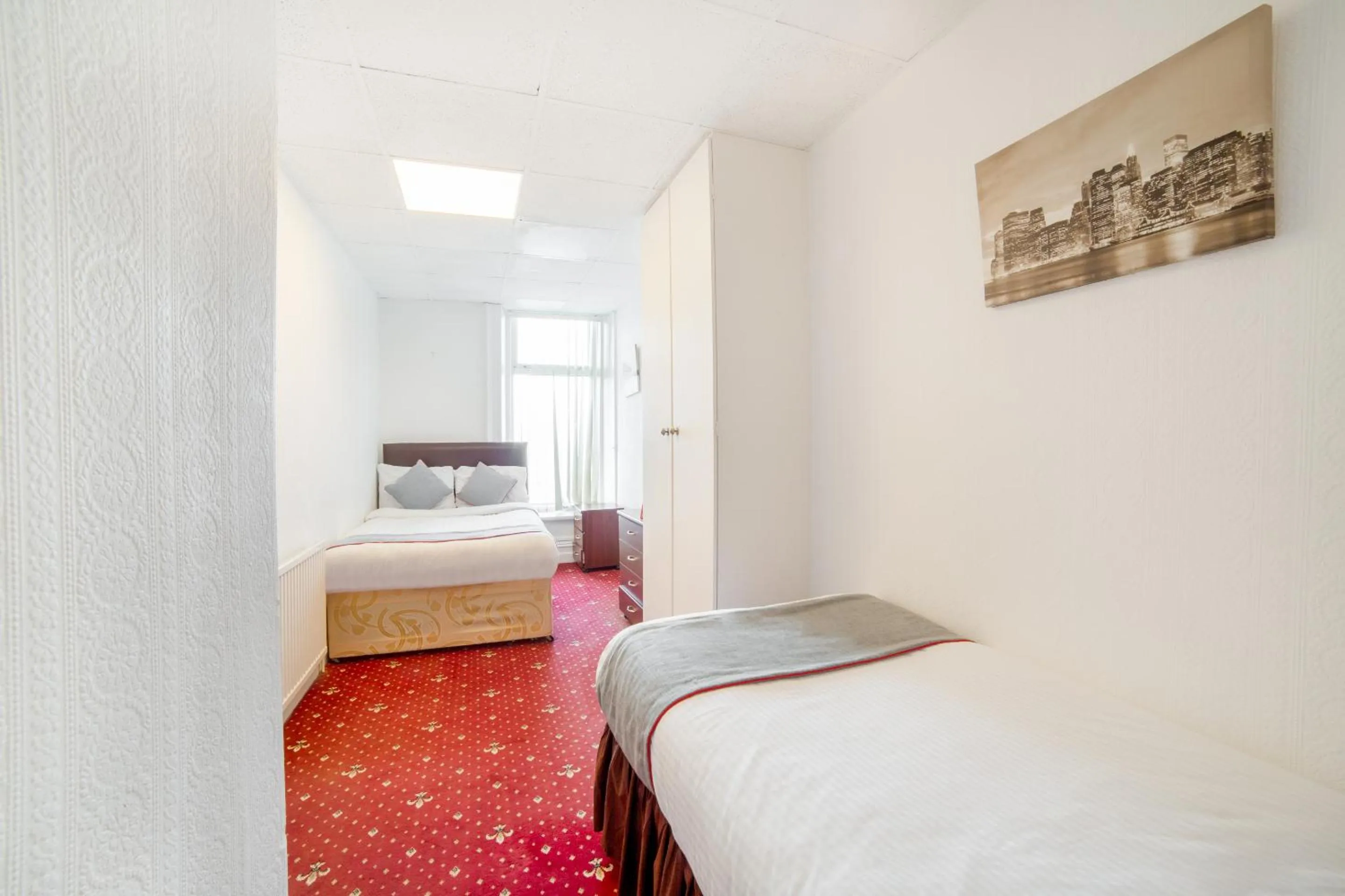 Standard Triple Room with Sea View in OYO The Golden Cheval Hotel