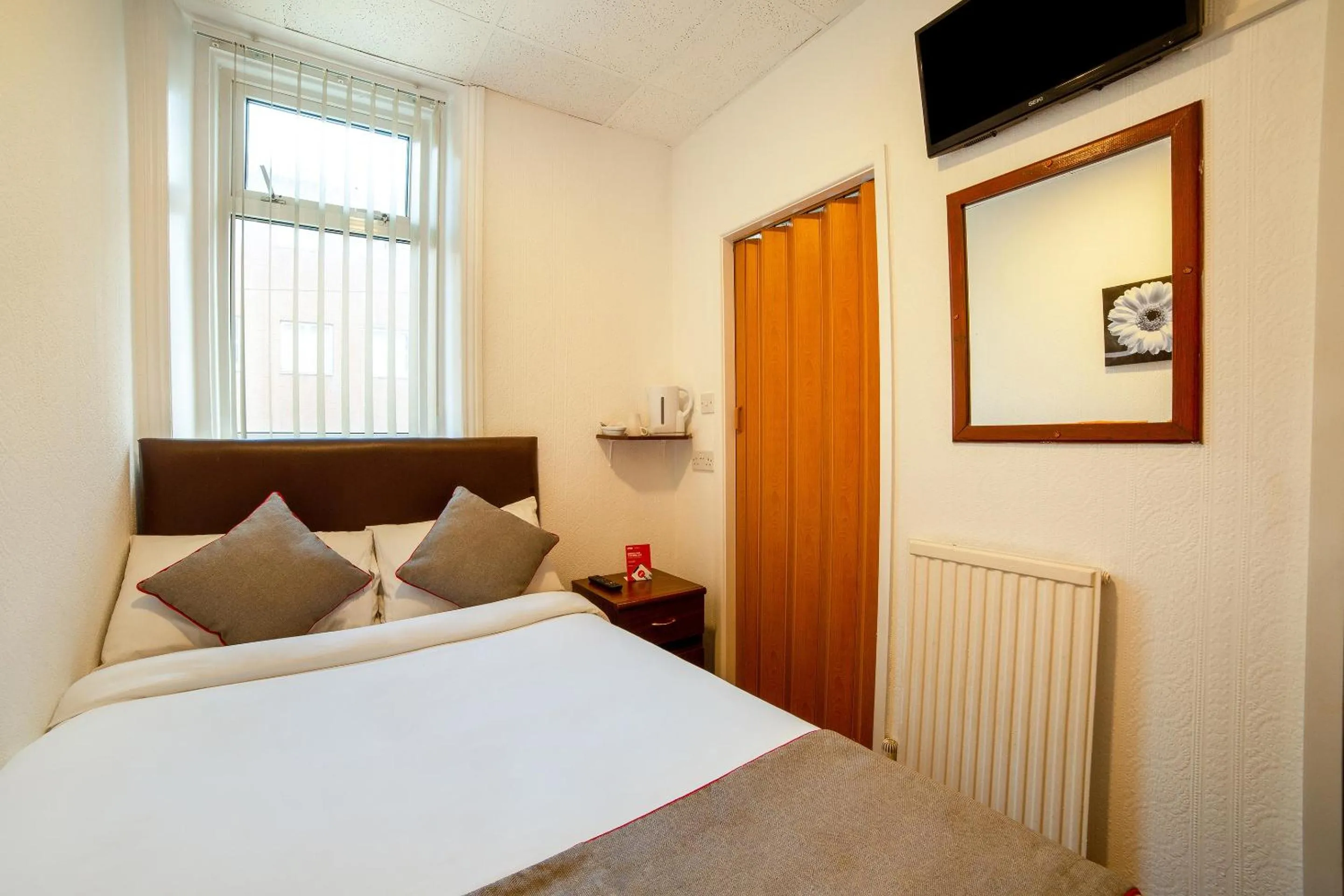 Bedroom in OYO The Golden Cheval Hotel