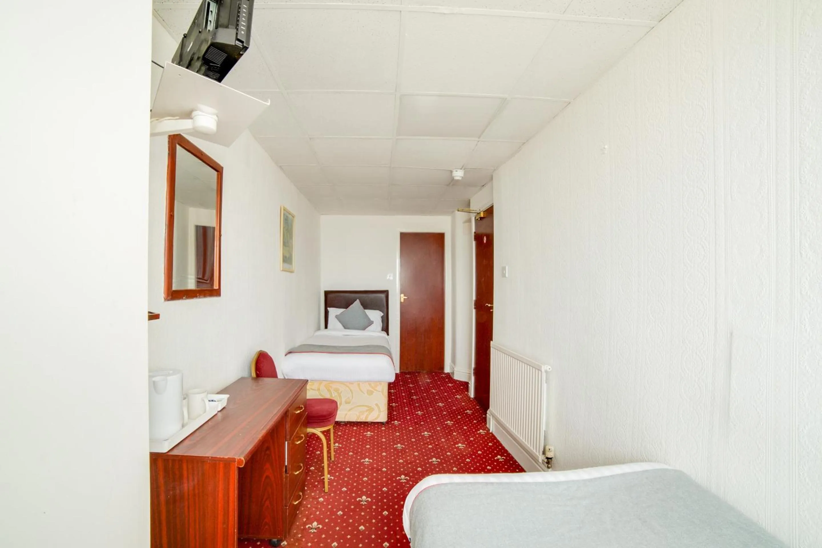 Bedroom in OYO The Golden Cheval Hotel