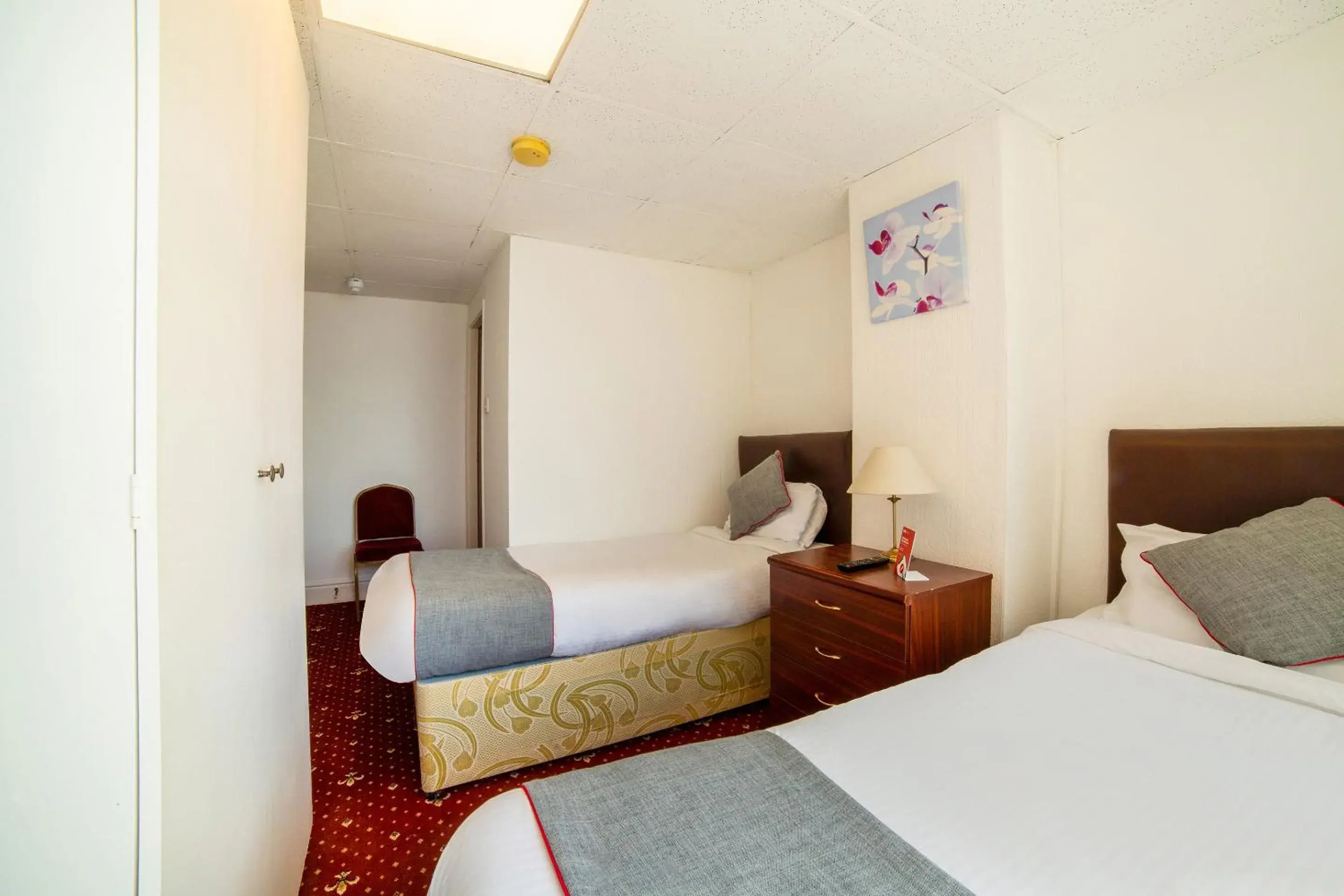 Bedroom in OYO The Golden Cheval Hotel Bedroom in OYO The Golden Cheval Hotel